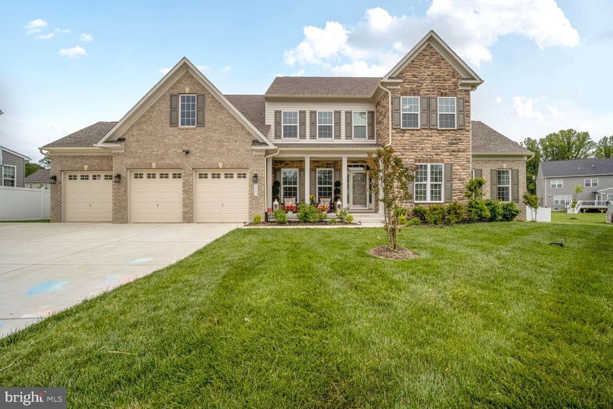 Welcome to this exquisite 6-bedroom, 5.5-bathroom home located at 5803 McIntosh Place in Brandywine, Maryland. With over 6,400 sq. ft. of beautifully designed living space, this stunning home offers luxury and comfort at every turn. On the top level, the owner's suite is a true retreat, featuring a gas fireplace, a covered deck with serene views, and two custom closets. The spacious en-suite bath is equipped with high-end finishes to enhance your daily routine. 

Discover the unique appeal of this property, featuring a thoughtfully designed main level that includes a second owner’s suite. This inviting space is enhanced by its own dedicated HVAC system, ensuring personalized comfort year-round. Perfect for guests or as a private retreat, this suite is a true highlight of the home. The gourmet kitchen boasts a 5 burner gas range, granite countertops, 10-foot island, and custom cabinetry,  perfect for meal prep and entertaining. The family room is highlighted by coffered ceilings and a cozy fireplace, creating the perfect space for gatherings. Enjoy formal meals in the dining room or relax in the sitting room. The sunroom provides additional living space filled with natural light. Luxury vinyl plank flooring runs throughout the main level, combining style and durability.  

The basement is designed for both relaxation and functionality with a spacious 1-bedroom and full bath. Whether you're hosting movie nights in the theatre room, working out in the gym/flex room, or enjoying your favorite beverage at the bar this basement offers endless possibilities. Additionally, there's an  unfinished storage space to meet all your storage needs.

Other highlights include a 3-car garage with 8-ft garage doors providing ample space for vehicles and storage. The walkout basement allows easy access to the backyard for outdoor entertaining. This home is truly one-of-a-kind, offering the perfect blend of luxurious living and thoughtful design. Don’t miss the opportunity to make this dream home yours!