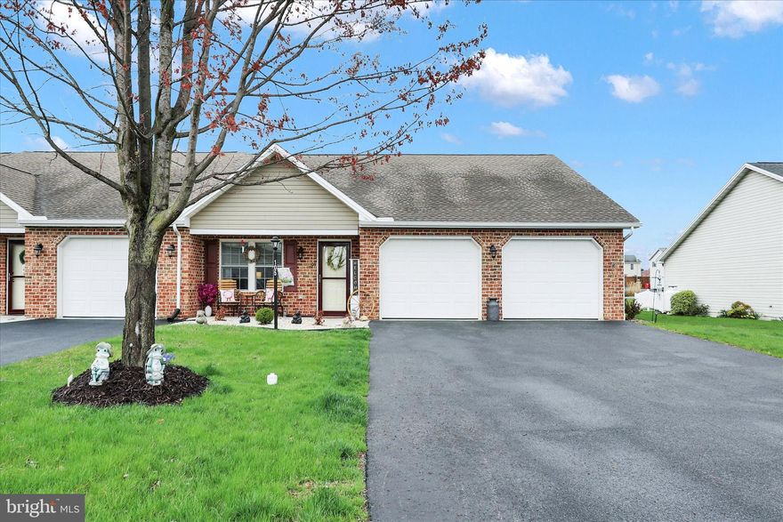 Lovely one level ADA handicap accessible end unit townhome now available in Thornwood Village. This beautiful low maintenance home features an open floor plan for easy entertaining. Luxury vinyl plank flooring recently installed in Living Room and Bedrooms. 1462 finished square feet of living space offers Spacious Living Room, two Bedrooms and two full updated Bathrooms, Kitchen/Dining Room combo with center island and custom cabinetry, Laundry area off of Dining Room, Two car oversized Garage with pull down storage, and Covered front porch and rear Patio. Property backs to drainage easement. Monthly HOA covers lawn care, snow removal, common  area maintenance, and roofs. Public Utilities. Convenient location close to schools and shopping.