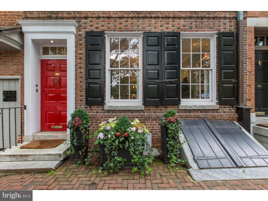 Located on picturesque Delancey St, this 5 bedroom, 4.5 bathroom, Federal style home has been immaculately updated w/ luxury finishes that highlight its original character & detail. Featuring soaring ceilings, beautiful random width pine floors, excellent natural light & well-appointed living spaces. Enter into the large foyer that leads to the grand staircase & hosts a custom storage closet. The elegant, sun drenched living room boasts gorgeous built-in shelving, gas fireplace w/ marble mantle & large windows w/ original shutters. Entertain in the over-sized dining room, home to an additional fireplace. No detail has been spared in the chef's kitchen. It features custom white cabinets, Carrera marble counter tops, Viking appliances, Sub Zero refrigerator, built-in microwave, a large pantry, & wine refrigerator. A sliding glass door opens to a charming brick patio w/ room for seating & a grill w/ an exterior gas line. The main floor also features a conveniently located half bath. The 2nd floor is home to a guest room w/ an en-suite bathroom & laundry closet. The stunning master suite showcases custom closets, original wood paneling, three soaring windows & a breathtaking master bath; a true oasis. The exquisite bathroom boasts a glass shower w/ a custom bench, shelf, & dual rain shower heads. Soak in the deep, stand-alone tub situated in front of an original fireplace. The luxurious modern double sink sits atop a custom vanity, offering beauty and function, complete w/ a linen and water closet. The 3rd floor includes 3 bedrooms, an updated full bath & original built-in, hallway shelving. One bedroom is currently being used as a play space. The 2nd bedroom includes an original fireplace w/ a lovely juliet balcony.  The 3rd bedroom is an excellent size also featuring a fireplace. The 4th floor entertainment space is complete w/ a full bathroom & kitchenette, including dishwasher, refrigerator, & additional storage. French doors open to a private roof deck that has been beautifully landscaped w/ outdoor seating & dining areas, a gas lined grill; a truly magical space. There are a total of six fireplaces in the home, 3 of which are functioning, 2 of which contain gas lines. HVAC was upgraded to 10 split zone units. 1-CAR PARKING INCLUDED. Situated in the heart of Society Hill in the McCall School District and directly across from Three Bears Park. A short walk to Headhouse Sq. Farmers Market, restaurants,shopping, & all Center City has to offer!