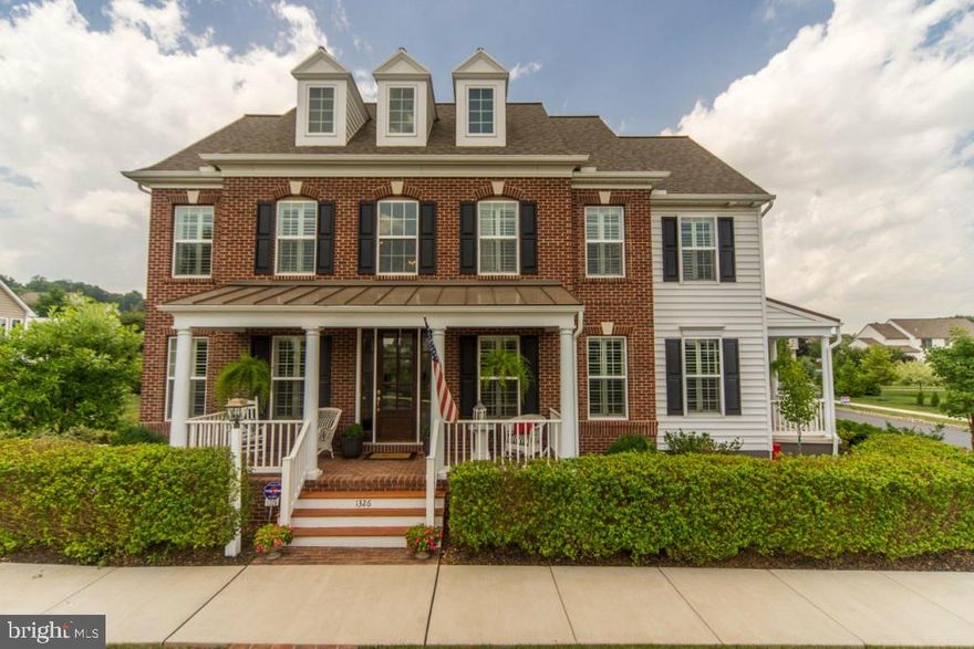 Spectacular home throughout w/ fabulous floor plan.  Home was originally featured in the 2010 Parade of Homes.  Exquisite kitchen design, cabinetry, granite counter tops, backsplash and appliances.  Beautiful hardwood floors and moldings on both levels.  The morning sun enhances the cozy living room and adjoining study.  Beautiful master with hardwood floors and spa bath with marble flooring.