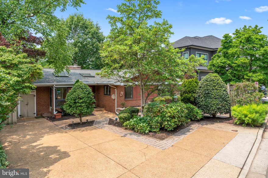 Exquisite Custom Two-Level Home in the Heart of Arlington. 

Tucked away on a private road, this remarkable 4-bedroom, 4-bathroom custom home offers an abundance of space, natural light, and the perfect combination of comfort and privacy. Located in one of Arlington's most desirable neighborhoods, this property is a rare gem that invites you to make it your own.
The home features an open and airy floor plan, designed to capture sunlight throughout the day. The main level offers seamless access to the expansive deck from the kitchen, dining area, and living room—creating the perfect flow for indoor-outdoor living. The deck itself is a true standout, giving you the feeling of being nestled in a treehouse, surrounded by nature and offering a peaceful retreat right at home.
The primary bedroom is a sanctuary, featuring an abundance of windows and direct access to the deck, providing a serene space to unwind. The spacious en suite bath offers luxurious amenities and ample room to create your personal oasis.  An additional secondary bedroom on the main level has access to the hall full bath.
The lower level expands the living space even further, offering 2 additional bedrooms with 2 full baths—perfect for guests or multi-generational living. A large office provides an ideal workspace, while the generous recreation room with a second gas fireplace creates a cozy retreat for entertaining or relaxing. Additionally, a second full kitchen on the lower level adds versatility, whether for hosting gatherings or accommodating extended family.
Located on a private road, just minutes from the best of Arlington's shops, dining, and parks. This home is just waiting for your finishing touches to truly make it your dream home. With its open spaces, private setting, and endless potential, this property is a must-see. 

Don’t miss your chance to own this exceptional home. Schedule a tour today and start imagining how you can make this space your own!