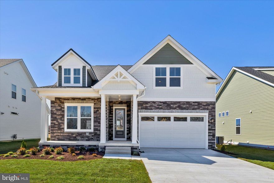 *OFFERING UP TO 12K IN CLOSING COST ASSISTANCE WITH USE OF APPROVED LENDER AND TITLE*
MOVE-IN READY! Where the golf course meets luxury—welcome to the Latitude. This stunning two-story home offers true main-level living with three bedrooms on the first floor, along with beautiful vaulted ceilings in the family room, kitchen, and foyer. The open-concept design features a spacious primary suite complete with a Roman shower and built-in shower seat. In the family room, enjoy the ambiance of your two-sided gas fireplace, which also warms the extended lanai featuring a gorgeous stone surround. Whether relaxing indoors or entertaining outside, you’ll appreciate the seamless comfort and charm this home provides. Perfectly positioned with beautiful golf course views, the Latitude delivers exceptional style, convenience, and luxury living at its finest.