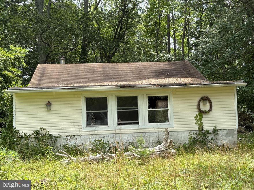 Investor Special! This rehab ready bungalow, just steps from Laurel Lake, offers great potential with 2 bedrooms, 1 full bath, living room, and eat-in kitchen. Enjoy a private backyard — perfect for outdoor potential or future upgrades.  Home needs rehab and is being sold strictly as-is, but offers an excellent opportunity for renovation and value-add.

*Property and all existing structures are being offered in as-is/where-is condition. Seller has never occupied this property, therefore buyers need to do their own due diligence regarding potential use and suitability.