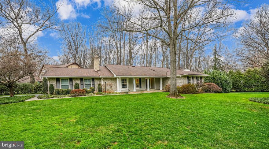 ***OPEN HOUSE CANCELLED***PROPERTY UNDER CONTRACT*** Welcome to 6600 Baymeadow Court, an exquisite residence that embodies elegance and comfort, located in the prestigious Langley Oaks neighborhood of McLean, VA. Nestled on a serene corner and meticulously landscaped 0.53-acre lot, this six-bedroom, three-and-a-half-bathroom home offers an extraordinary blend of sophistication and functionality.
Spanning over 4,900 square feet of thoughtfully designed living space, this home welcomes you with a large, inviting living room featuring floor-to-ceiling windows that flood the space with natural light. Beyond the living area, the chef’s kitchen combines style and functionality with custom cherry cabinetry, a full granite backsplash, and professional-grade appliances, including a 5-burner Wolf cooktop and a double-wall oven. A spacious breakfast bar and an adjoining Breakfast Room addition with a cathedral ceiling and Palladian window leading to a charming Ipe wood deck make this space ideal for daily living and entertaining.
The family room exudes warmth with its raised brick hearth fireplace, complete with a wood stove and mantel, flanked by built-in cabinets and bookshelves—wonderful for gatherings and quiet evenings alike.
The primary suite is a true retreat with an en-suite bathroom featuring custom cherry cabinetry, dual porcelain sinks set into granite countertops, and a glass-enclosed shower with a built-in bench. Access to an Ipe wood-screened porch completes this serene oasis. The three additional bedrooms with ample closet space share the updated hall bath. 
The expansive lower level provides versatile additional living space, including a second family room, an exercise/game area, two bedrooms, and a full bath, all with a private entrance leading to a flagstone patio—perfect for hosting guests or extended family.
Enhancing the home’s functionality are premium features such as an architectural-grade shingle roof, a 13-zone irrigation system, a whole-house dehumidifier, and an automatic humidifier, all designed for modern comfort and ease.
Ideally situated, 6600 Baymeadow Court offers unparalleled access to top-rated schools, upscale shopping, fine dining, and major commuter routes, including the George Washington Parkway and Washington, DC.
Discover a harmonious blend of luxury, privacy, and convenience in this exceptional Langley Oaks home. Schedule your private tour today and experience the epitome of refined living.