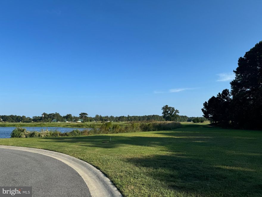 Set at the furthest interior point of GlenRiddle, this 0.88-acre waterfront estate parcel offers one of the community’s most secluded and visually striking settings. Enjoy an expansive natural backdrop with direct frontage along Mud Creek paired with wide-angle golf course views, creating a rare dual-view homesite unmatched elsewhere in the neighborhood. Positioned at the end of a quiet cul-de-sac, the property combines privacy with an impressive sense of arrival—ideal for a luxury coastal residence.

With very few buildable lots remaining in GlenRiddle, this homesite is among the most attractively priced waterfront opportunities in the community. Recent land activity has shown values ranging from the mid-$400s to over $1M, underscoring the long-term appeal of premium parcels within the development.

The lot is cleared, served by public water and sewer, and includes a golf membership. Residents enjoy access to two championship golf courses, marina facilities, a full clubhouse, fitness center, tennis and pickleball courts, outdoor pools, and year-round programming. Its quiet position deep inside the gates offers exceptional privacy while maintaining convenient proximity to Ocean City, Assateague, and Historic Berlin.