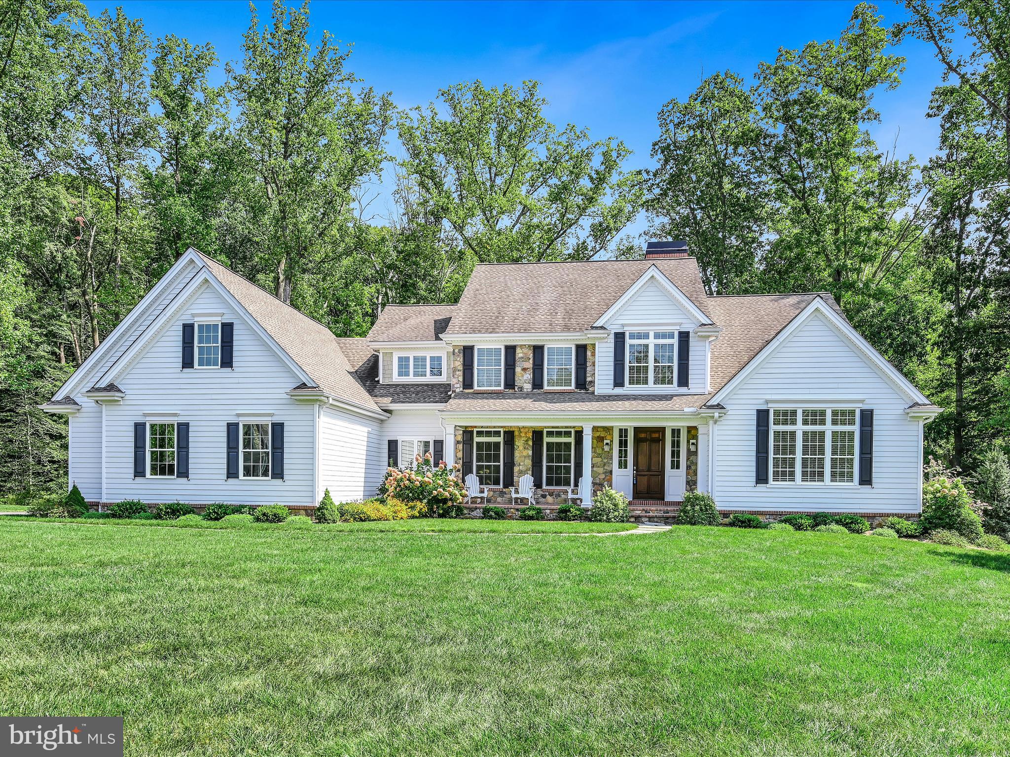 Welcome to this exquisite custom home, crafted by Bancroft Construction in 2016, where luxury and convenience converge in a picturesque setting. Situated on a private cul-de-sac, this residence features a timeless stone and Hardie plank exterior. Large windows throughout the home fill the generously sized rooms with natural light, showcasing the beautiful hardwood floors that run seamlessly across both levels.
The open floor plan effortlessly connects the living spaces, making it ideal for both everyday living and entertaining. The first-floor master suite provides a luxurious retreat, while the finished walk-out basement, with its expansive windows, offers additional sunlit living space. The home includes 4 bedrooms, 4.5 bathrooms, and a large cook’s kitchen with a spacious eating area that flows into the family room.
Nestled on a private lot backing to conserved wooded land, the home offers serene views. Located along the prestigious Route 52 corridor, it provides easy access to Wilmington and Philadelphia, making it perfect for those seeking a harmonious blend of tranquility and accessibility. This exceptional property is ready to become your forever home.
