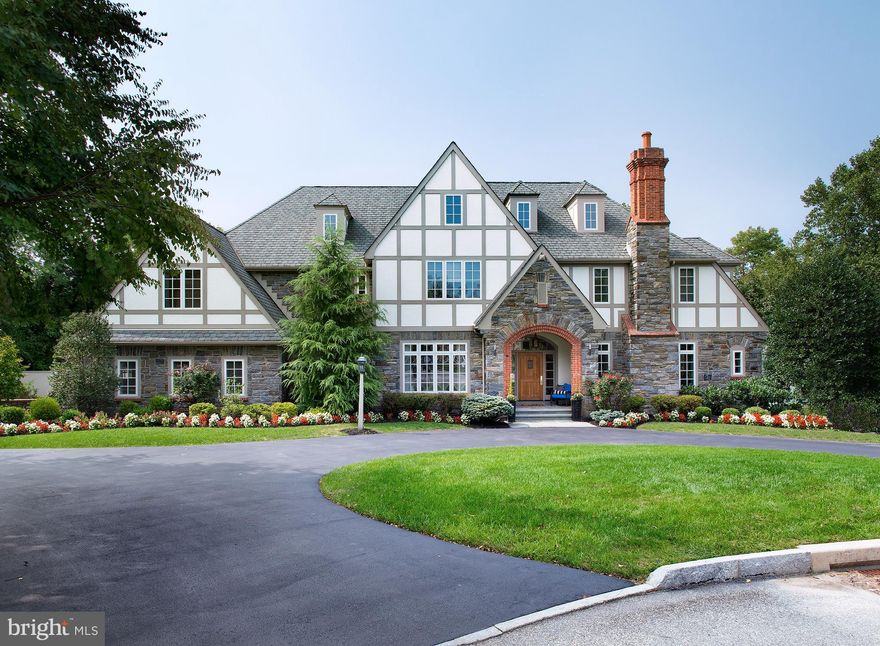 Full stucco remediation! Magnificent 5 bedroom, 4.2 bath estate manor home on a wooded cul-de-sac lot, in the exclusive Fenimore community of Gladwyne! Boasting pristine landscaped grounds, a circular drive, stone and stucco exterior, and striking peaked rooflines, this is the rare beauty you ve been searching for. Expansive, meticulously-designed interiors and divine private outdoors with a state-of-the-art vanishing-edge pool, soothing spa, granite fountains & fire pits, and serene patio areas heighten the allure of this upscale family residence.  Elegant from top to bottom is the impression you ll get the moment you enter the gracious traditional center hall. A sweeping staircase rising to a bright windowed open landing, rich hardwood floors, tasteful wainscoting, and light-filled French doors to the rear outdoor oasis adorn the 2-story traverse foyer. This high-end Main Line gem is both a finely-appointed showplace and a comfortable place to call home. Extensive millwork & built-ins, designer color tones, airy architectural ceilings, top-of-the-line luxury finishes and sun-filled windows enhance the ambience. Live comfortably and entertain effortlessly with a fabulous flow from room to room, and to the blissful outdoors. A large living room with stone fireplace and wall of windows opens to a handsome wood-clad library through French doors. Host guests in the formal dining room and whip up meals for family and guests in the top-of-the-line chef s quarters featuring a huge center island, granite counters, custom cabinets, commercial-grade Wolf, Miele & Sub-Zero appliances, workstation & spacious pantry. Open from the kitchen is a lovely breakfast room with patio access, perfect for casual dining, an exquisite family room with a coffered ceiling and slate fireplace for relaxing movie nights, and a convenient mudroom with cubbies. Comfortable, stylish sleeping chambers await upstairs, with the master suite highlight. The dramatic cathedral-ceilinged bedroom is complemented by walk-in-closets and a stunning spa bath with dual vanities & soaking tub. Four additional bedrooms offering en-suite baths & abundant closet space reside on the upper level, as does a sky-lit laundry room. There s also a full basement, 3-car garage, central air, speakers & sprinkler system. All this in a prime location, zoned for top-rated Lower Merion Twp. schools, near the village of Gladwyne, beautiful Bridlewild Trail & major transportation routes.