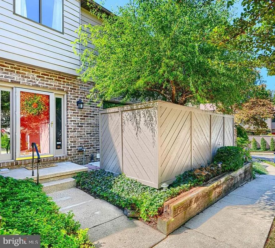 Step into modern comfort and generous spaces with this beautifully renovated 3-bedroom, 2 full/2 half bath residence nestled in one of Towson’s most sought-after neighborhoods. This home has been thoughtfully updated to blend classic charm with contemporary luxury. Interior Highlights: A gourmet kitchen featuring white shaker cabinetry, white quartz counter tops and stainless appliances, the space has room for a small table, perched next to the sliders, what great nature watching, and is perfect for quiet mornings. This is also where the laundry is located. The inspired bathrooms with designer finishes invite relaxation and indulgence. Refinished hardwood floors that glow with warmth and character, flowing seamlessly throughout main level including the kitchen. The home offers 2 cozy wood burning fireplaces, one in the inviting living room, the other in the serene primary suite, ideal for curling up with a book or sharing intimate moments.  There is generous overhead lighting. The lower level offers a large family room with wet bar and mini refrigerator, great for movie or game nights!  The storage room is clean and could easily fit another refrigerator or exercise equipment. The Primary Suite is a retreat.  Wake up to lush, wooded views from your private sanctuary. Enjoy a dressing area, walk-in closet, and your own fireplace, a rare blend of comfort and luxury.  Additional Perks, the nearby Y and walking trails, and the West Towson Park, which are only a few blocks away.