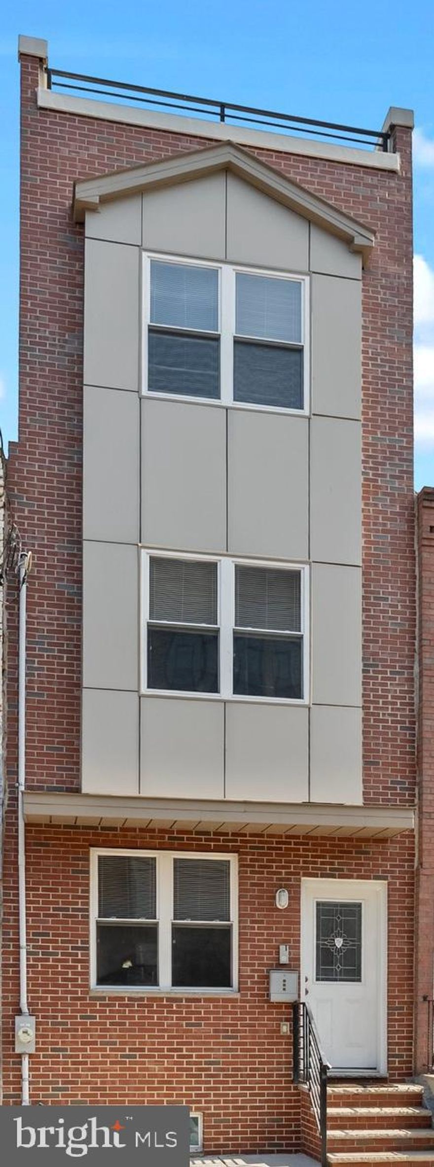 Price Improvement !!!
Stunning New Construction in South Philly! 4BR, 2.5BA with Rooftop Deck & Finished Basement

Welcome to your dream home in the heart of South Philadelphia! This brand-new construction offers modern city living with spacious comfort and sleek design. Boasting 4 spacious bedrooms, 2.5 luxurious bathrooms, and a finished basement, this home has everything you need for contemporary city living.

Step inside to find an open-concept main floor with hardwood flooring, high ceilings, and oversized windows that flood the space with natural light. The designer kitchen features granite countertops, stainless steel appliances, custom cabinetry, and a large island perfect for entertaining.

Upstairs, you'll find generously sized bedrooms, including a serene primary suite with an en-suite bathroom. The finished basement offers versatile space ideal for a media room, home gym or office.

Head to the private rooftop deck to enjoy panoramic views of the Philadelphia skyline; perfect for relaxing evenings or hosting gatherings.

Located on a quiet block in sought-after South Philly, you're just minutes from restaurants, parks, shops public transportation, and major highways.

Don't miss this rare opportunity to own a modern gem in one of the city's most vibrant neighborhoods! Schedule your private tour today! Bring all offers! Motivated seller!