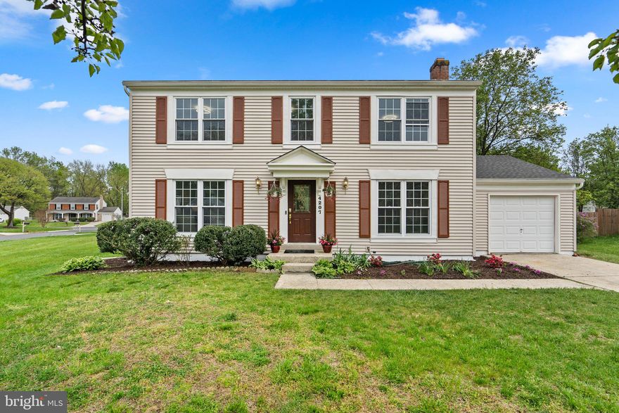 When you first enter you'll notice how bright it is inside. To the left you'll enter the formal living room with floor to ceiling type windows. The formal dining room is in the rear right off the kitchen  that has been updated with new cabinets and high end quartz counters and brand new stainless steel appliances. There is a sliding glass door off the rear that allows you to step out onto your private deck and look out over your private fenced rear yard. Additionally on the main level you'll have a spcaious family room with a wood burning fireplace and a laundry / mud room that has access to the private one car garage.  The upper level is finished with the owners suite off to the right which includes a modern upscale en-suite bath with two closets. There is a second private rear facing bedroom with it's own bath. There are two other bedrooms and a shared hall bath. The lower level is copletely re-imagined with two large open rec room spaces and a rear private bedroom which could be guest suite or home office as there is also a full bath. Other features include recessed lighting throughout the home to make sure it's bright and modern. The high efficiency heat pump is brand new as is the architectural shingle roof.  There is private driveway parking for 2+ cars. It's more than 10,000 sq ft corner lot. The location is super convenient to the bowie town center. Within 5 minute drive to grocery / shopping and many restaurants. This home will be perfect for your summer get togethers and easy commute to DC or Baltimore as needed.