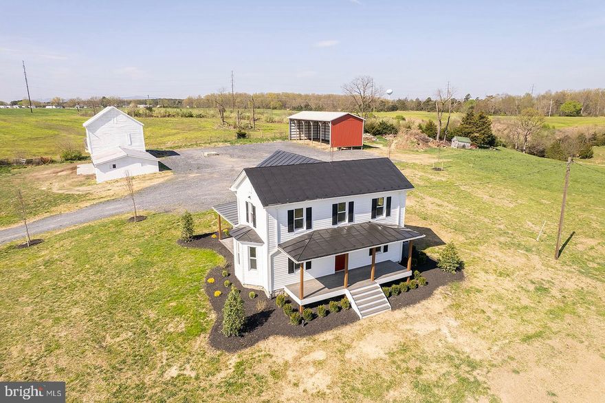 Welcome to this stunningly renovated farmhouse nestled on 35 acres of picturesque Virginia countryside. This property has been completely updated with a brand new kitchen which includes all new appliances, new flooring and fresh paint throughout, and beautiful landscaping, making it the perfect blend of historic charm and modern comfort! As you step inside this three-bedroom, two-bathroom home, you'll be immediately impressed by its charm and stunning views of the surrounding Blue Ridge Mountains. The brand new kitchen features all the modern appliances and amenities you need to prepare delicious meals for family and guests.
The farmhouse also includes three comfortable bedrooms, each with plenty of space and natural light. The two full bathrooms have been completely updated with new fixtures and finishes, making them both stylish and functional.Outside, the property is truly a nature lover's paradise. With 35 acres of rolling hills, meadows, woodlands, and a pond, you'll have plenty of space to explore and enjoy the great outdoors. The property also includes a charming barn and other outbuildings that can be used for storage or converted into a workshop or studio, etc. This property is just minutes from the area's best restaurants, shops, and attractions. Whether you're looking for a peaceful country retreat or a place to call home, this renovated farmhouse offers the perfect balance of comfort, style, and location. Don't miss out on the opportunity to make this stunning property yours!!