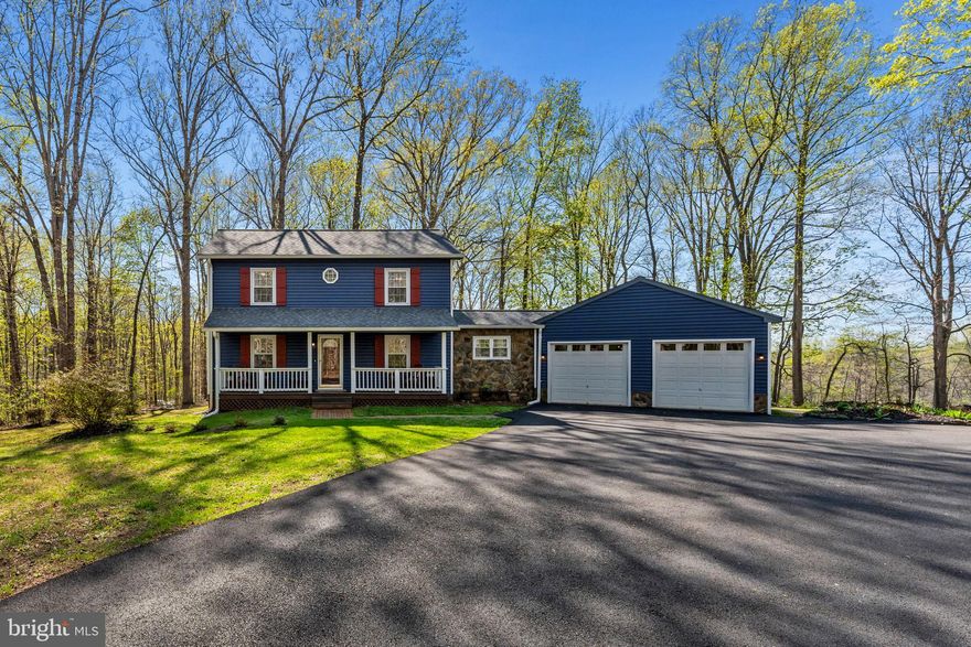 Run don't walk!  I am truly proud to present this lovely and impeccably maintained 3 bedroom 2.5 bath home on a picturesque acre and a half.  

The covered front porch that runs the length of the home welcomes you, and this is just the beginning!  Upon entering you'll love the gleaming new white oak flooring (2025) and all the natural light that makes this home shine.  Traditional layout with a beautiful country kitchen and large eat in area.  Laundry room is located  just off the kitchen and a separate mud room with a large closet and recently replaced window connects the home to the oversized garage.  The newly overlayed driveway boasts enough space for 6+ cars. 

New luxurious neutral carpet was installed in on the stairs and full upper level (2025).  Bedrooms have large closets and bathrooms are light and bright!  

Additional upgrades include a new water softener (2022), well pump (2025) and both rear doors were replaced (2026).  New siding and shutters were installed this year (2026) and a new roof, gutters and downspouts were added (2021).

The rear deck off the kitchen overlooks a magnificent back yard.  It's perfect for family and entertaining or just enjoying your own little piece of paradise!  Serene surroundings with seasonal mountain views while still being conveniently located near shopping, dining, and commuter routes.

This home truly shows beautifully and is ready to impress!