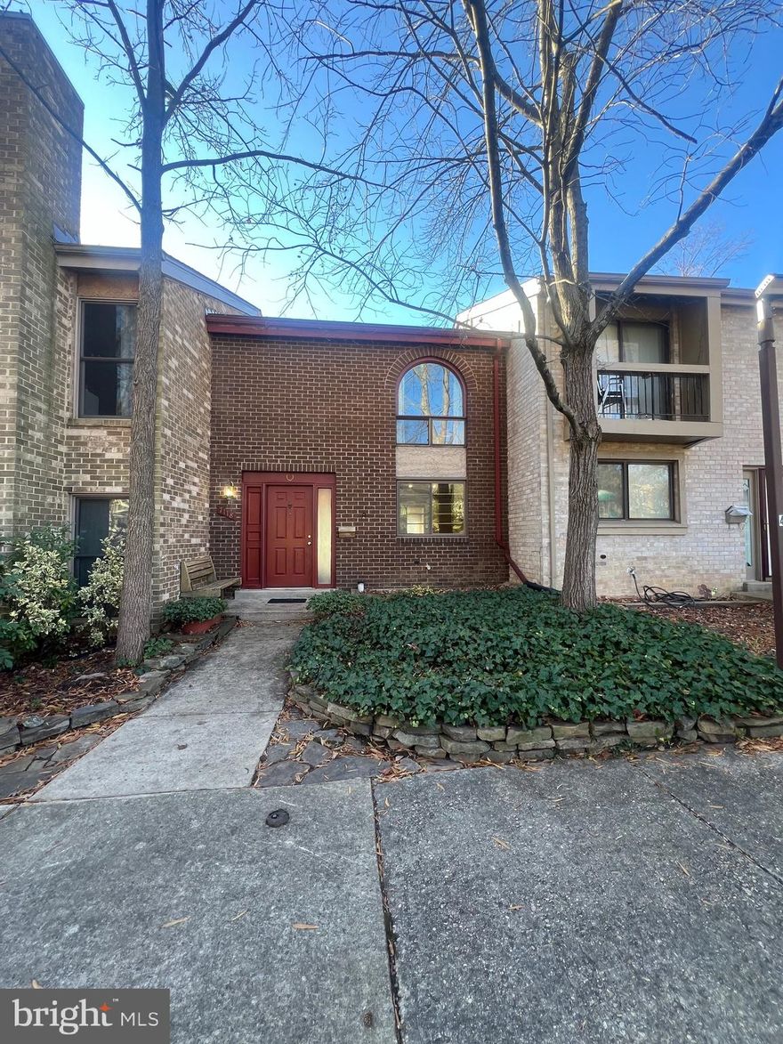 Welcome to this well-maintained home nestled in a peaceful community with serene wooded views. This townhome offers both comfort and convenience which boasts 3 bedrooms and 3.5 bathrooms.  The open floor plan seamlessly connects the living and dining areas providing ample room for entertaining and an oversized balcony facing the backyard ideal for enjoying your morning coffee or unwinding after a long day to enjoy the tranquil views of the lush woods behind the property, perfect for relaxation and privacy. Enjoy the charming built in shelving throughout the home and a bathroom on every level.  Finished Basement features a walkout to a patio and finished rec room with plenty of storage available. Ideally located near NASA Goddard, NSA and with quick access to 295 and major highways with many options for shopping.  This home blends style, comfort, and convenience.  Includes 1 assigned parking space and parking pass for guest parking. This home was very well loved and ready for you to make it a home. Come see for yourself before it’s gone!