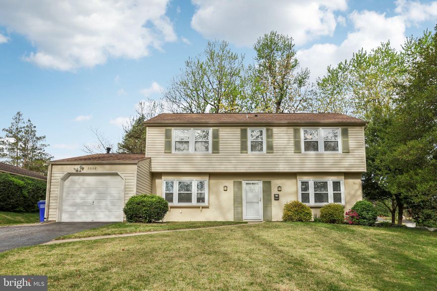 Welcome to 3008 Tanbark Ln, a beautifully updated home offering modern touches in a sought-after, convenient Bowie location. This inviting residence features three bedrooms, two full bathrooms, and one half bathroom, one-car garage with EV charger, driveway space for up to 4 cars, and a large flat, private backyard with shed. Step inside to find hand-scraped bamboo flooring (2020) in the kitchen and dining areas, providing a warm and contemporary touch. Enjoy peace of mind with a newer HVAC system and water heater (2019), along with a new front door, storm door, and new glass French doors (2024) that bring in abundant natural light. The kitchen includes stainless steel appliances including a new oven (2022) and dishwasher (2023), making it both functional and stylish. Additional updates include new lighting fixtures in the powder room, dining area, and primary bedroom (2023),  an expansive primary suite walk-in closet, new ceiling fans, a large updated back patio with planters, bedrooms with LVP flooring, and more. Move-in ready and full of charm, this home is ready for its next chapter. Schedule your showing today and discover all that 3008 Tanbark Ln has to offer!