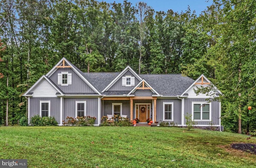 This stunning 3-bedroom, 2.5-bath residence was thoughtfully crafted by Spartan Homes and offers the perfect blend of comfort, style, and convenience. The open floor plan seamlessly combines a modern and elegant kitchen, dining area, and living room—anchored by a striking stone fireplace with gas logs—creating the ideal space for both everyday living and entertaining.

Step outside and enjoy the inviting outdoor spaces, whether relaxing on your cozy covered porch or gathering with friends and family around the fire pit.

Just a short golf cart ride away, you’ll find the neighborhood common area, where your assigned covered boat slip with lift (#21) makes enjoying the lake effortless. For added convenience, the owner also has a Tahoe boat available for sale, offering a turnkey opportunity to embrace the lake lifestyle from day one.

Nestled in the upscale neighborhood of Mill Run, this property provides a serene setting with the luxury and quality you deserve. Whether you’re hosting, entertaining, or simply unwinding, this home is designed to impress.

Mill Run is conveniently located on Kentucky Springs Rd, just 10 minutes from Food Lion,  within 15 minutes of most local restaurants, and is within 1 hour of Charlottesville, Fredericksburg, or Richmond.