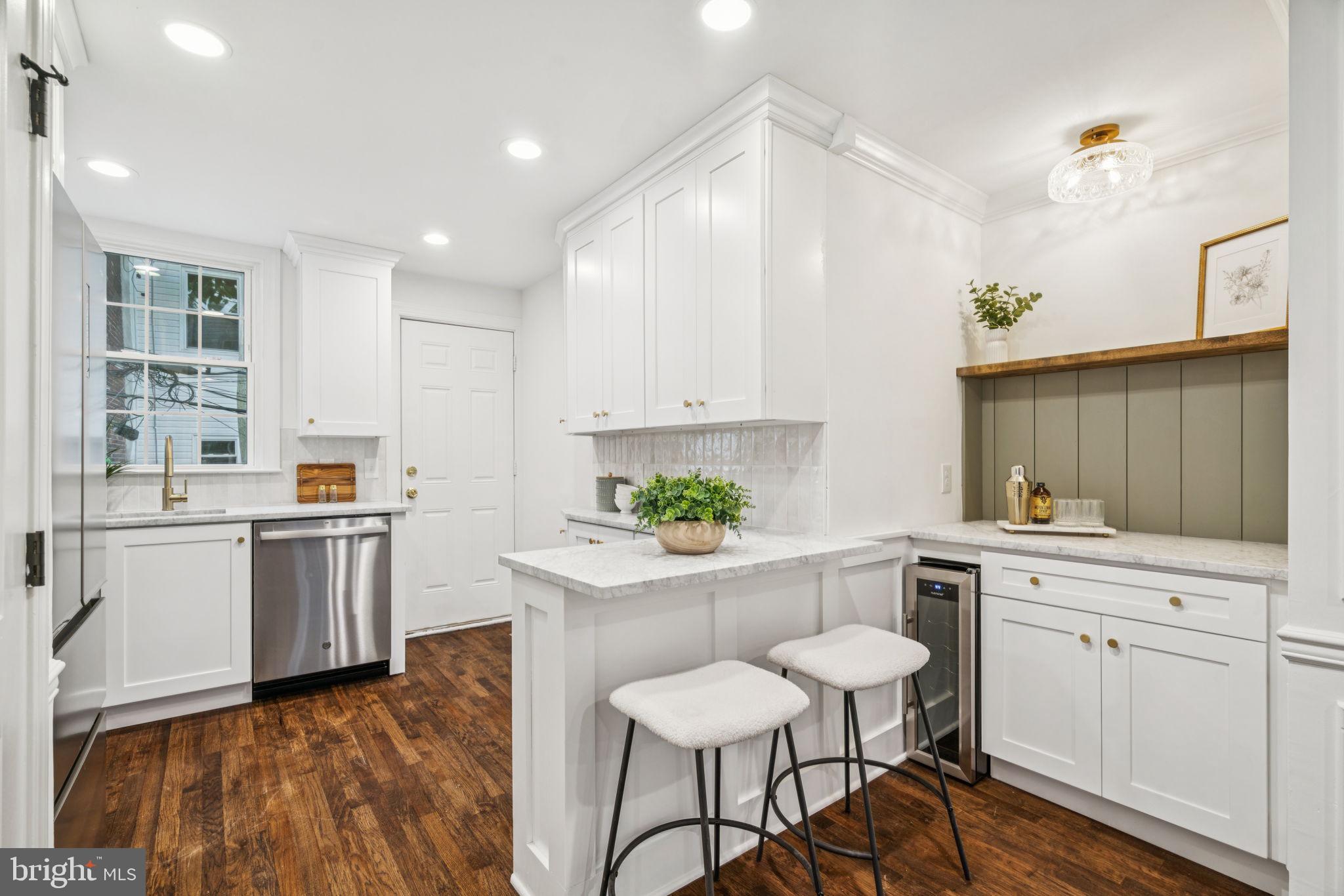 Welcome to this stunning home located in the popular Point Breeze neighborhood. Boasting three bedrooms and one and a half bathrooms, this residence offers a perfect blend of modern luxury and timeless charm. Step inside and be greeted by an open and airy floor plan, flooded with natural light that accentuates the high-end finishes throughout. The spacious living area is ideal for entertaining guests or simply relaxing with your loved ones. Gleaming hardwood floors, recessed lighting, and large windows create an inviting ambiance that is sure to impress. The gourmet kitchen is a chef's dream, featuring top-of-the-line appliances, sleek marble countertops and ample storage space. Whether you're hosting a dinner party or preparing a casual meal, this kitchen is equipped to handle it all. The adjacent dining area provides a seamless flow, making it easy to enjoy meals with family and friends. Don't miss the opportunity to make this gem your own.