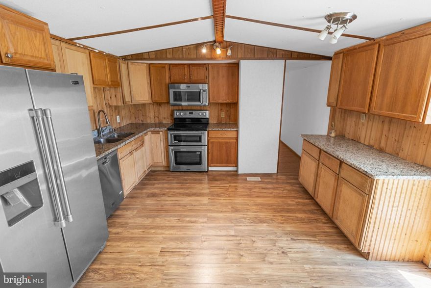 Welcome to your next adventure in luxury living (on a budget)! Are you ready to dive into a one-of-a-kind real estate experience? Let me introduce you to this gem: A four-bedroom, 1.5-bath haven with the potential to splash its way into your heart.

Step into this single-wide trailer and prepare to be amazed by the massive addition that expands this home beyond your wildest dreams. As you explore, you'll find yourself in awe of the expansive master bedroom, fit for royalty. But wait, there's more! Picture yourself making a grand entrance into your very own indoor pool. Yes, you read that right! Complete with a slide and diving board, this aquatic oasis is perfect for making a splash or simply lounging in style.

Feeling the need to relax after your swim? Look no further than the untouched hot tub awaiting your personal touch. And for those fitness fanatics, imagine the possibilities of transforming ample space into your dream gym.

But the luxury doesn't stop there! Venture outside to discover .67 acres of fenced-in freedom, complete with a shed and a charming barn just waiting to be restored to its former glory. And for those chilly nights, why not consider harnessing the power of nature with the wood boiler, ready to heat your pool to the perfect temperature?

With a little TLC, this property is poised to become the talk of the town. So, if you're ready to make a splash and turn your housing dreams into reality, don't let this opportunity slip through your fingers! Contact me today to dive deeper into the potential of this extraordinary home. Trust me, you won't want to miss out on this adventure! 🌟