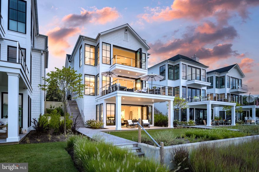 Are you looking for one of the most coveted waterfront properties in Annapolis, Maryland? 279 State Street, a world class location, perfectly overlooking Spa Creek; this Annapolis jewel is a boaters paradise. And while some people dream the dream, these residents are actually living it!
       This waterfront oasis is located at the South Annapolis Yacht Centre (SAYC) and is one of the six newly constructed single-family residences built in 2021. Designed to cater to boat owners, it offers a premier waterfront lifestyle on Spa Creek that is nearly impossible to match. SAYC serves yachts up to 135 ft, complete with all modern amenities, giving those who choose to dock a boat here, the most simple, easy and convenient option there is in Annapolis.
       Pyramid Builders has constructed an elegant and sophisticated home totaling 4660 square feet. Its modern open floor plan features 3 bedrooms, 3.5 baths and maximizes natural light throughout the residence. This home feels like a slice of heaven the moment you walk through the front door.
You will be drawn in by the exceptional quality. The herringbone patterned floors and elegant curved staircase create a striking architectural statement.
       Blending multiple mediums in design and fabrication, this world class home has an array of distinctive features. Its living space flows gracefully from room to room and opens up to outdoor decks on all three levels. A splendid fire table provides a great mood for entertaining your guests.
The kitchen, equipped with a central grand island, Wolf and Sub-zero appliances, custom cabinetry, and exceptional lighting is a top-tier first class masterpiece that is suitable for the A-List.
Water views are visible from all living areas and are accentuated by the magnificent floor to ceiling accordion glass doors.
       279 State Street is an ultra rare property located in the heart of Annapolis in Eastport.
This location overlooking the Spa Creek, is nearly impossible to match and even harder to find. Consider this a rare opportunity to view something that nobody has, and everybody wants.

Featured in Coastal Style Magazine - March/April 2024