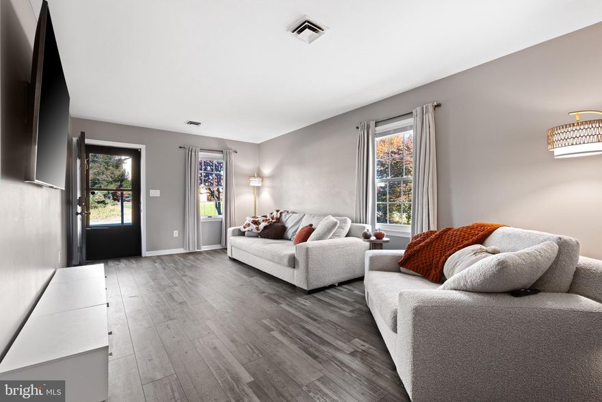 This end-row townhome isn’t just a place to live — it’s a vibe. It’s everything you’ve been looking for: size, style, location, and an incredible value all wrapped into one. From the moment you step through the front door, you feel it — that instant “wow.” The spacious living room, highlighting an open layout that’s as inviting as it is versatile. It’s the perfect space to entertain, unwind, or host your favorite people for game night. Flow right into the oversized kitchen and dining area — thoughtfully designed. Stainless-steel appliances, tons of cabinet space, a walk-in pantry around the corner, and a convenient half bath too, which has been fully updated. Just off the dining area, open the door to your covered back patio overlooking a beautifully maintained green space. Imagine morning coffee, weekend barbecues, or quiet evenings with the Conococheague Creek as your backdrop. Bonus: the attached garage makes bringing in groceries a breeze.

Head upstairs, and the drama continues. A statement staircase with designer lighting leads you to the oversized primary suite — your personal retreat with generous closet space and a fully updated, spa-inspired bathroom. The secondary bedrooms are impressively large — ideal for guests, family, or a dedicated home office. Another renovated full bath means no updates needed. This home is completely turnkey.

Every detail has been dialed in: renovated kitchen and baths, new flooring, fresh paint (2022–2023), and refreshed exterior finishes. Modern design meets low-maintenance living — perfectly balanced for your next chapter. From the moment you walk in, you’ll know — this isn’t just another listing. This is home. Book a tour today before it's gone!