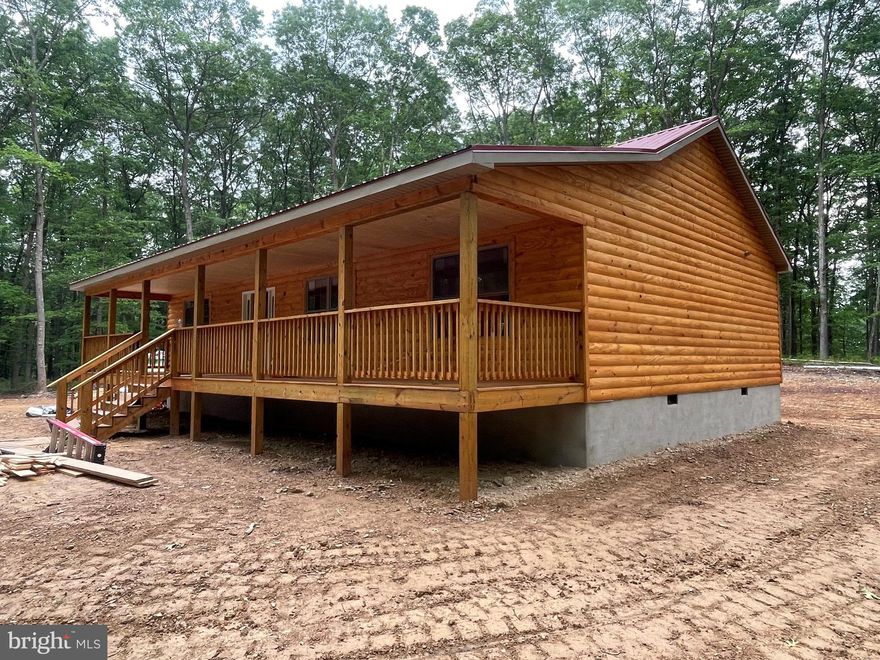 Lost River WV Cabin on 5 Acres!!  Minutes from Lost River State Park, Trout Pond Rec Area & Kimsey Lake which is stocked year round. Newly Constructed 1,500 Square Foot Log Home, With 3 Bedrooms and 2 Full Baths.  Completely Open Floor Plan Featuring an Expansive Great Room w Vaulted Ceiling & a  Large Kitchen with Quartz Counters, SS Appliances and an Island Great for a Quick Meal on the Go.  Quality Craftsmanship from Top to Bottom-Solid Pine Paneled Doors Throughout, Tongue and Groove Natural Pine Walls, 20 mil LVT Flooring, Over 60 Can Lights and more. Exterior is Natural Log Siding, with a Black Metal Roof, and also Features an Amazing Front Porch to Enjoy the Seasonal View, or Just Sit and Listen to it Rain on a Warm Summer Evening.