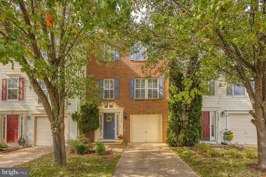 Location, Location, location and amenity filled HOA is why this area is sought after!   HOA amenities and map under documents.  Driveway parking, plus one assigned space and plenty of street parking close to TH.  Commercial vehicles  are ok for street parking . Seller has recently professionally had whole house and carpets cleaned.  Recently updated the lighting and all exterior door/locks handles.
Three level interior townhouse with one car garage has three bedrooms, two and a half bathrooms. Lower living room with wood burning fireplace, large family room off kitchen and three season room off other side of the large eat in  kitchen with kitchen island.  Large wood deck off of the three season room with gas hookup for your grill! Anderson French doors to deck have the built-in adjustable blinds.   WHOLE HOUSE ...... has plantation blinds!  Master bathroom has been updated to give you the spa like atmosphere. The master bedroom is very large with two walk-in closets.  Freshly power washed home, fresh mulch and all new exterior lights make the home very desirable.  Members of the Association have access to a wide variety of friendly amenities.  See documents

The HOA offers -  5 well-maintained pools and a spray ground, 2 community centers, 6 tennis courts, 3 pickleball courts, a multi-use court, 12 basketball courts, a volleyball court, access to the water via our boat ramp, 19 playgrounds, 2 fitness station clusters and county trails throughout the Lake Ridge community. Visit for all the info. A Bi-monthly magazine of Lakeridge, delivered to every resident.