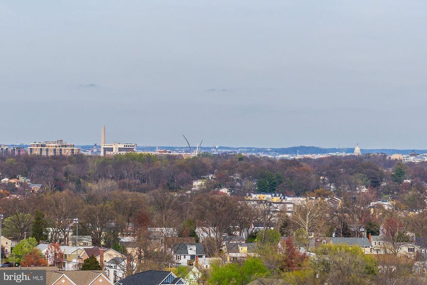 A NEARLY $35,000 PRICE IMPROVEMENT!!!  AN INCOMPARABLE OPPORTUNITY TO OWN A RARE AND SOUGHT-AFTER LARGE, UPPER LEVEL UNIT AT SKYLINE PLAZA WITH 2 GARAGE PARKING SPACES!!!   DON'T SETTLE FOR SOMEONE ELSE'S TASTE.  THIS IS PRICED TO ALLOW YOU TO MAKE IT YOUR OWN!!!  Don't miss this opportunity to purchase an end unit, upper level large, stair-free home with copious storage, garage parking and an incomparable view!  You will be close to Washington, DC, surrounded by shops and restaurants with public transportation at your front door!!!  Choose to live with a car or car-free!    This RARE and SPLENDID VIEW is available for the first time in nearly three decades!  Gaze over the horizon at the Washington Monument, U.S. Capitol, National Cathedral and everything in between from the privacy of your 20' BALCONY.  Enjoy the national fireworks every July 4th in the comfort of your pajamas! This VIEW is STUNNING!    In addition to the INCOMPARABLE VIEW, your new one-level home has as much space (1712 s.f.) as many multi-level homes without the hassle of stairs.  NATURAL LIGHT streams in through LARGE WINDOWS many of which have been replaced.  The home has just been PROFESSIONALLY PAINTED and is ready for you to move in time for the upcoming holidays! The foundation of the living, dining and all bedrooms is real WOOD FLOORING.  The EAT-IN KITCHEN with PANTRY has been wonderfully UPDATED with BRAND NEW GRANITE COUNTERS, REFRIGERATOR, SINK, PULL-DOWN FAUCET & CABINET HARDWARE. The MASTER BATHROOM has been FULLY RENOVATED with a granite-topped vanity, toilet, shower and tile floors.  The SECOND BATHROOM has been RENOVATED with a new vanity, toilet and shower hardware. The large den/office/study is easily convertible to a THIRD BEDROOM. There is copius STORAGE including 2 WALK-IN CLOSETS, 5 additional closets and EXTRA STORAGE in the building.  Most LIGHT FIXTURES have been replaced.  The large balcony provides a low-maintenance space outdoor space for relaxing, entertaining and container gardening!  Never shovel snow again.  You have TWO GARAGE PARKING SPACES!  The condo. fee includes ALL UTILITIES and wonderful COMMUNITY AMENITIES including a 24-hour front desk, on-site professional management, security, outdoor pool, 2 fitness centers, sauna, billiards room, party room, bicycle storage, tot lots, picnic area with grills and a variety of social events.  A convenience store, beauty salon and doctor's office are also in the building.  On-site maintenance technicians may be hired for a variety of jobs.  This LOCATION is so CONVENIENT!  Everything you need surrounds you.  Metro Bus line 25B picks commuters up at the lobby's front door and travels to the Ballston Metro Station.  There are LOTS OF SHOPS and RESTAURANTS within 2 blocks including Target, TJMaxx, World Market, HomeGoods, Burlington, CVS, Giant, Harris Teeter, Starbucks, Chipotle, Olive Garden, Einstein Bagel, District Taco, Silver Diner and a variety of international cuisine options.  Trader Joes, Panera, Marshalls and Best Buy are one flat mile away.  Two well-regarded area hospitals  are within 3 miles.  You are only 6 MILES FROM all of the employment and cultural opportunities on offer in WASHINGTON, DC and Ronald Reagan Washington National AIRPORT.  Two entrances to 395 are within one mile.   HURRY!  When this special home is gone, it is likely that will not be available again for another 30 years!  Have we mentioned THE VIEW?  Welcome home!