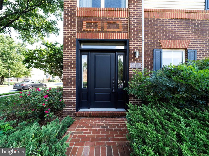 Welcome to your new home! This stunning 4-level end-unit townhome—formerly a model home—offers exceptional upgrades and stylish design throughout. Exposed brick walls and gleaming hardwood floors add warmth and character to the living spaces. The spacious owner's suite includes a relaxing sitting area and a luxurious en-suite bath, featuring a spa shower with built-in seat, jetted soaking tub, ceramic tile flooring, and a double-sink vanity.  Enjoy the top-level loft—perfect for entertaining or unwinding—with its own wet bar, skylight, and access to a private outdoor terrace. An additional bedroom and full bath on this level provide extra privacy and flexibility. The gourmet kitchen is a chef’s dream, boasting granite countertops, 42" cabinetry, an island with seating, double pantry, stainless steel appliances, and a 5-burner gas cooktop. Ideally located near Wegmans, Lowe’s, popular restaurants, urgent care, gas stations, and major commuter routes—this home has it all.  Don't miss your chance to see it—schedule a tour today!