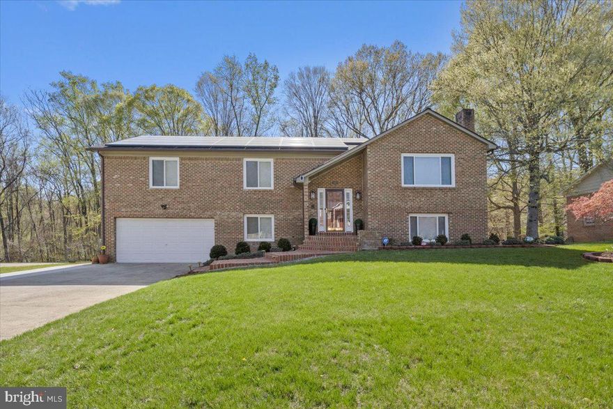 Second chances don’t come often! Back on the market after buyer got cold feet due to solar panels—snag it before it’s gone!” Come Tour— an incredible value for this beautifully updated 4-bedroom, 3-bathroom home in the highly desirable Tantallon North subdivision of Fort Washington, situated on a spacious 0.52-acre lot. This home perfectly blends traditional charm with modern upgrades, offering both elegance and functionality.

Step inside to discover an inviting open floor plan that seamlessly connects the living, dining, and kitchen areas. The recently renovated kitchen is a true standout, featuring a massive 10-foot quartz countertop that comfortably seats six, sleek stainless steel appliances, and upgraded cabinetry—ideal for entertaining! Just off the kitchen, a stylish coffee bar/butler’s area adds extra convenience and sophistication.

The main level also includes a large primary suite with a private en-suite bathroom and spacious closet, creating a peaceful retreat. Two additional generously sized bedrooms and a beautifully updated full bath offer comfort and luxury.

Outside, enjoy the brand-new deck with built-in lighting, perfect for evening gatherings or quiet relaxation while overlooking the expansive backyard.

Downstairs, the finished basement is a true highlight with a wet bar, a fourth bedroom, and a full bath—ideal for entertaining, a home theater, or a game room. Cozy up by the fireplace for a warm and inviting atmosphere.

Additional Highlights: