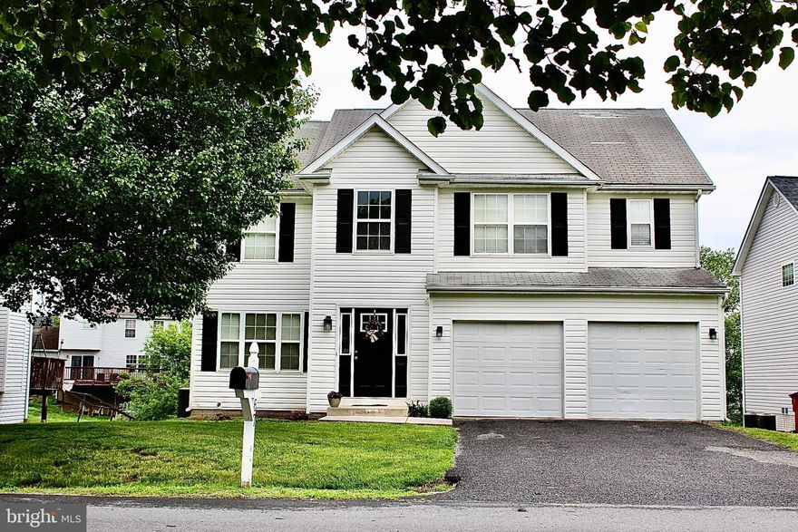 BACK ON THE MARKET DUE TO NO FAULT OF THE SELLERS! Absolutely beautiful 4 Bedroom/3.5 Bath Colonial in Mills Farm with just under 3000 sf of finished living space. Dual zone HVAC, vinyl plank flooring on the entire main level, carpet in the bedrooms and basement,  stainless steel appliances, brushed nickel fixtures and hardware and granite countertops. Additional Features include: Two story foyer and great room, second floor laundry, completely finished basement, which could be used for a 4th bedroom, super clean two car garage and large rear deck. The primary suite features two walk in closets, separate soaking tub and shower and double bowl vanities. Great location just minutes to I-81.