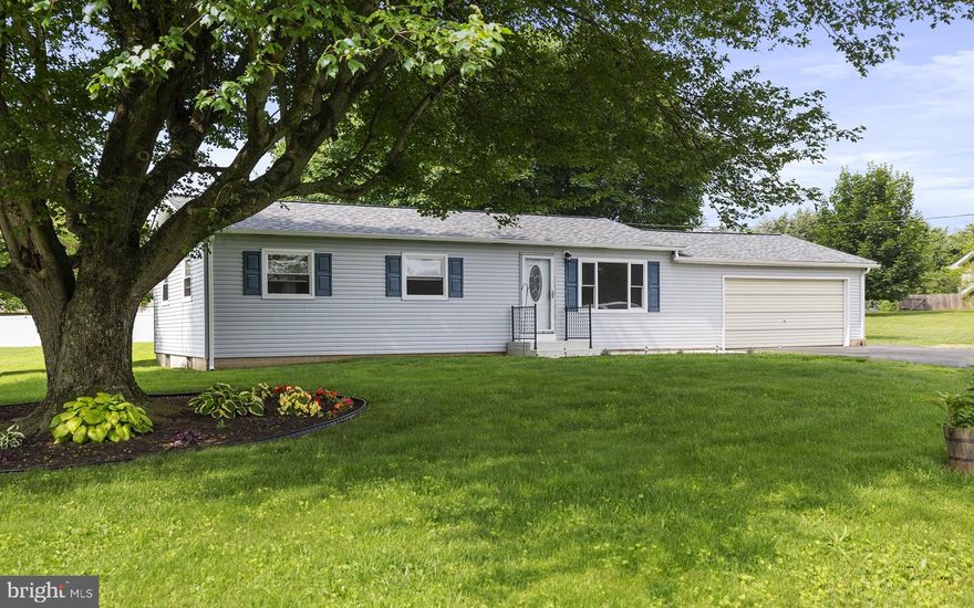 RANCH HOME IN RURAL SETTING!   Three bedroom ranch, full basement and two car garage.  Great for first time buyer or that next step of downsizing.  Beautiful yard makes a great playground for children or adults :), plenty of room and shade for outdoor events.