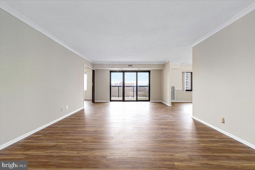 Expansive 3BR/2.5BA corner unit with 1,600+ SqFt, large eastern-facing balcony with excellent views, and one assigned garage parking space (#758, G-level), three additional unassigned parking lot spaces, and one storage unit (#908, B-2 level via storage room)  in a 37-acre wooded and landscaped community with endless amenities and conveniences. All utilities and use of all community amenities are included in the condo fee. Two miles from the location of the new Inova Alexandria Hospital at Landmark development.

WHAT MAKES THIS UNIT STAND OUT? Largest corner unit floor plan and second largest floor plan overall. Bring your vision and personal touch to create exceptional value. New floors were recently installed and the unit has been freshly painted. One assigned garage parking space and one storage unit are included with the sale.

WHAT MAKES THIS COMMUNITY STAND OUT? Resort-style living at home! Watergate at Landmark boasts incomparable amenities and services available to all homeowners including security (24/7 security personnel, gated entrances, 100+ security cameras, and more), community services (in-house maintenance, freshly prepared food and grocery market, salon, shuttle service, and more), outdoor activity (swimming pool, tennis, pickleball, basketball, putting green, playground, gazebos, trails, and more), and indoor activities (fitness center, pool with hot tub, tennis, pickleball, racquetball, game room, golf practice, sauna, party room, and more). The community also hosts a wide range of adult, family, and pet friendly activities. Visit WatergateAtLandmark[dot]com for more community information.

WHAT MAKES THIS LOCATION STAND OUT? Conveniently located  less than 10 minutes to Metro and the brand new world-class Inova Alexandria Hospital (coming 2028). Short drive to two airports, Washington DC, Old Town Alexandria, the Pentagon, Amazon HQ2, parks, golf courses, and all major Northern VA roadways.