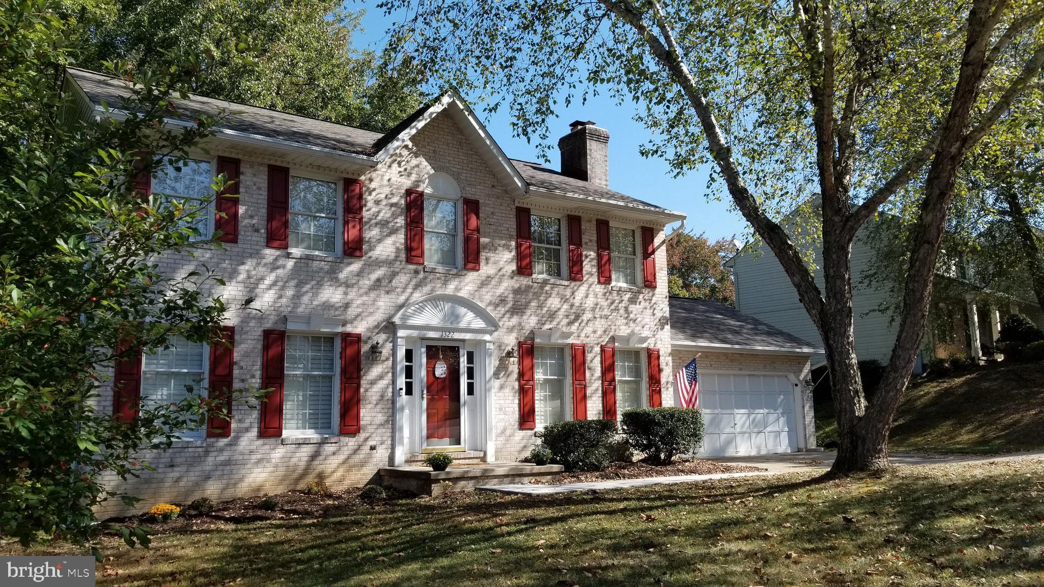 Nestled on a .64 acre lot, this 3 bedroom, 3.5 bath brick front colonial sits on a gorgeous park like setting. The upgraded kitchen offers, mood lighting, white appliance package, trendy ceramic back splash, and granite counters. The oversize master bedroom offers master bath and a huge walk in closet with a closet storage system. The lower level offers more finished living space including a kitchenette, rec room and play area. Enjoy sitting on your deck overlooking your private tree studded backyard with a running stream.