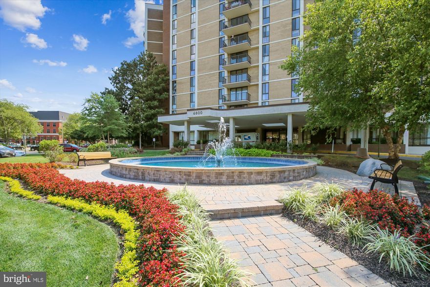 Where else can you find a modern, sun drenched 2br/2ba PENTHOUSE condo with a BALCONY and GARAGE parking in Mclean for under $500k?! Come in and fall in love with the floor to ceiling renovations, then step out onto the balcony and let the stunning VIEWS take your breath away!  Light, bright, and open floor plan with maintenance-free wood plank porcelain tile flooring throughout the entire unit. The kitchen offers quartz countertops, backsplash, and stainless steel appliances.  Elegantly tiled bathrooms with recently (2024) updated lighting, vanities, and faucets.  Full-size washer and dryer in unit (additional common area no-charge laundry on each floor).  Customized primary bedroom walk-in closet plus extra storage on lower level. Enjoy peaceful views of the Tysons Corner cityscape from your own private balcony.  Pamper your car with your own secure, underground garage parking space ($20,000 value!).  Easy living where the monthly condo fee includes all utilities, staffed front desk, fitness center with rowing machine and sauna, outdoor pool with impressive deck for plenty of sunshine time, ball courts, grilling area, picnic area, and salon! Commuting is a breeze with bus stop to metro, shopping, and restaurants.  A delightful spring walk/bike ride to nearby shops, grocery stores, post office, parks, library, trails, delis, and cafes.  Convenient access to Chain Bridge Road, GW Parkway, I-495 Beltway, Dulles airport, and GMU.  A true 'Lock-it and Leave-it' lifestyle that's the perfect opportunity for low-maintenance downsizers, or on-the-go first-time buyers. Great opportunity to live the city life and retreat to private life! Come for the 12th floor view of the pool and stay for the garage parking!