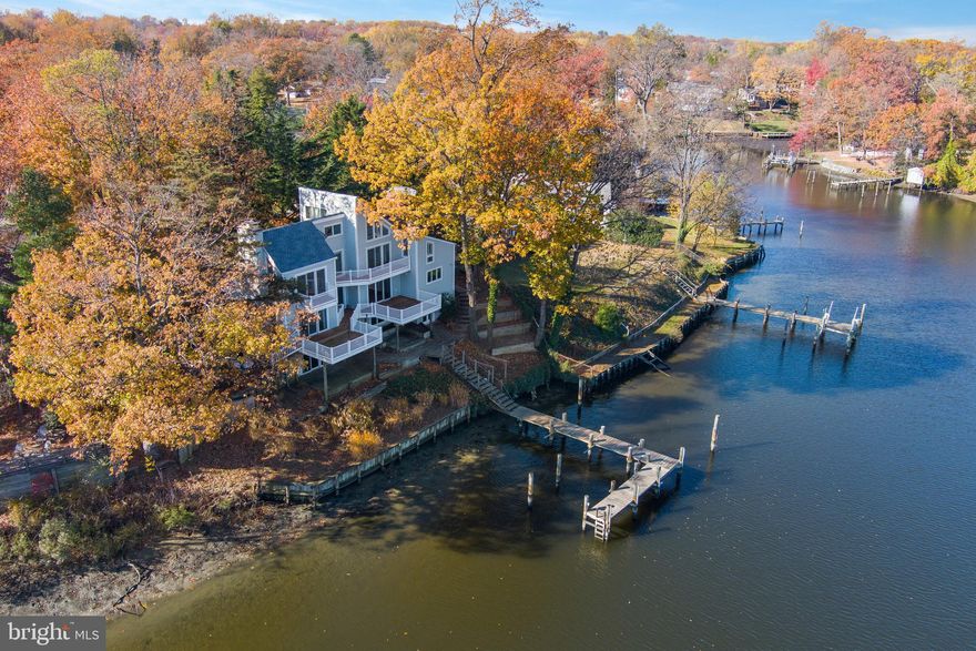 MAJOR PRICE ADJUSTMENT!!!! Eastport Waterfront!!!! LOCATION LOCATION LOCATION.  Extraordinary opportunity to own the best view on Back Creek. This Eastport home has over 3200 sq feet, with deeper water and  4 bedrooms, with separate units allowing for guests and family members who want their own space.  Second floor suite with a fireplace, tall ceilings, large remodeled bath and bedrooms with a loft to boot. The view is spectacular.   First floor has expansive views with 2 bedrooms, the "Main" bedroom has handicap access with a remodeled bath and large walk-in closet.  Downstairs has a living room, bedroom, and large bath.  It can be its own apartment with easy access to the backyard, dock and water.  Small Fenced area for pets, a dock that can handle 2 boats, Private and has water depth 3' plus. Seconds to downtown Annapolis by water, Water Taxi can be minutes away, Close to restaurants, shopping, local fun and entertainment. Handicap access ramp to enter home if necessary. There's a Variance that allows for expansion on the first floor from the kitchen, ARCHITECT information available for those who would like ideas!  Being sold "as is".