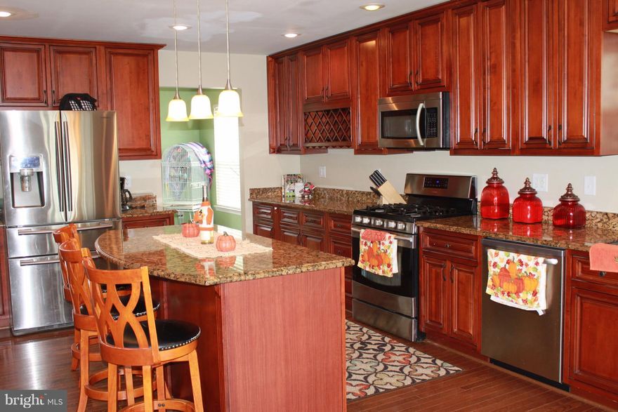 A must see! Seller assist with closing & home warranty. Hardwood floors & carpet in movie room. Great sun room & office. Upgraded bathrooms & new carpet in Movie room. Fence is less than 16 months old. Huge Master bedroom with his & her closets. Basement is another living area and will not disappoint. Additional room in basement can be used as bedroom.Great School District! Colonial Forge High!