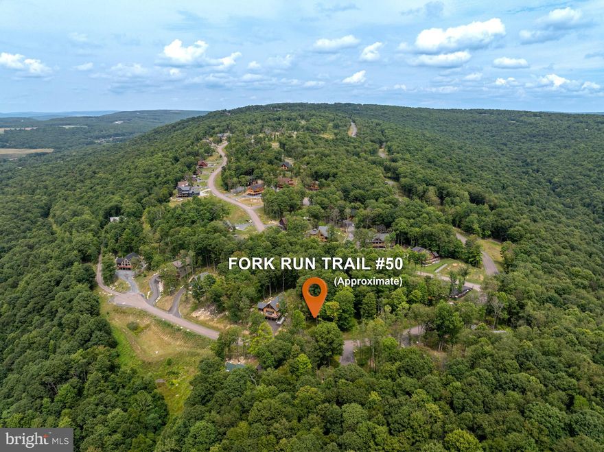 Lot 50 North Camp is situated in a private area of the community with potential for mountain & sunset views. Surrounded by mature trees and natural boulder features, this lot is also serviced by public water and sewer, as well as underground electric & utilities. Conveniently located nearby chair 7 at Wisp Ski Resort, North Camp is a ski-in/out community and is close to all your DCL favorites. HOA fees cover road maintenance, snow removal, and trash/dumpster. Minimum square footage of new construction is 1,800sf* and there is an architectural review committee with more specific guidelines. Call/contact for more info on this lot, the HOA in general or covenants and restriction info.