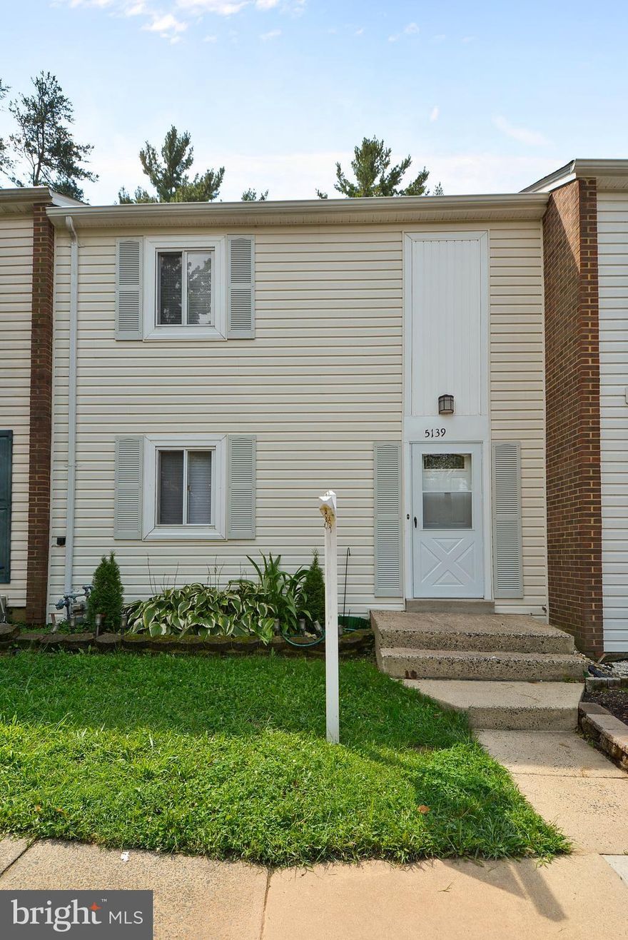 Gorgeous updated townhouse with wood floors and loads of sunshine.  Updated kitchen with granite counters, tile back splash and  tall dark wood cabinets.  Basement with separate room and attached full bath.  Fenced backyard.  Freshly painted, new carpet and ready for move in.  Close to GMU and VRE.  .