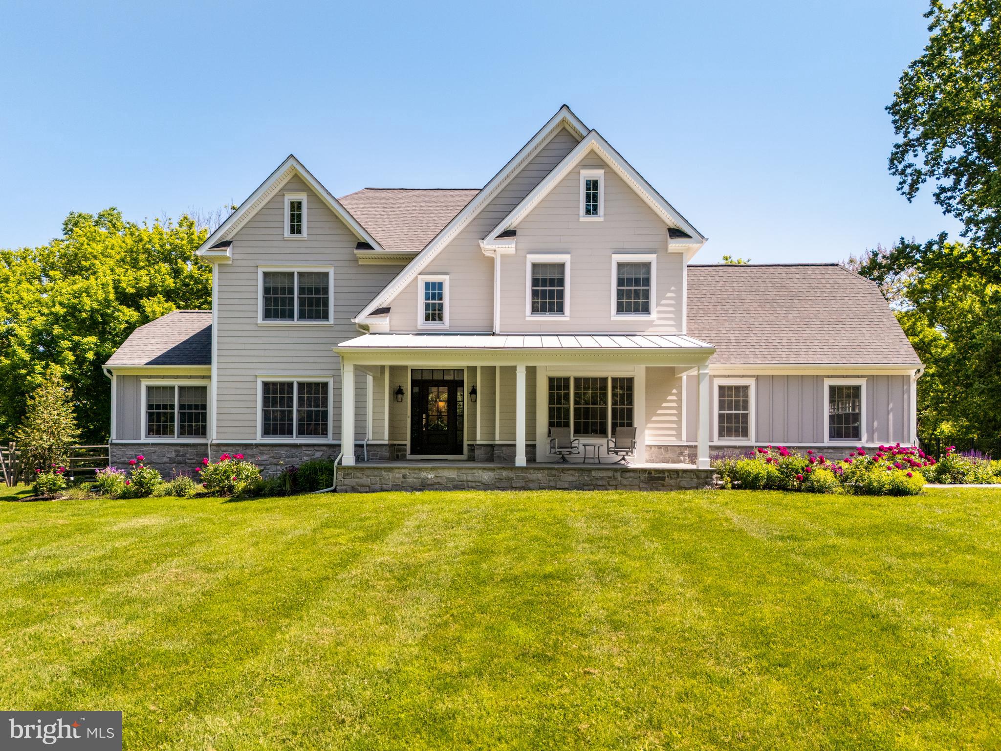 Experience two plus acres of peaceful beauty surrounded by nature on this private lot! This 4-bedroom haven in Whitemarsh Township offers just that – escape from the daily grind without sacrificing convenience. Step inside the grand two-story foyer, a warm welcome to your completely refreshed home. The entire property has undergone a transformation, both inside and out. Exterior and interior design is by award winning architect Asher Slaunwhite + Partners, Jenkintown, PA with natural landscape planning by Terren Design, Conshohocken. The exterior boasts a brand-new look with gleaming siding, stylish doors, and a gorgeous rear deck, perfect for extending your living space and enjoying the huge back yard.
The heart of the house lies in the large eat-in kitchen, completely redesigned for easy socializing as well as serious cooking. Imagine gleaming new appliances, stunning granite countertops, and ample storage space – a chef's dream come true. A perfect space for meals with loved ones and cozy evenings by the wood burning fireplace in the adjoining family room. Need a dedicated space for work or hobbies? The versatile living room seamlessly connects to a private bonus room, ideal for an in-home office or a quiet reading nook. Hosting a dinner party? The formal dining room, adorned with crown molding and bathed in natural light, provides the perfect setting. Enjoy lazy afternoons reading under a shady tree or hosting barbecues on the gorgeous, expansive rear deck, creating memories that will last a lifetime in the huge fenced in backyard
The convenience factor doesn't end there. The first floor boasts a laundry room, a powder room, and a two-car garage for ultimate ease. Imagine waking up to sunlight streaming through the windows of your sprawling and luxurious primary suite, a private sanctuary with dual walk-in closets, a spa-like bathroom, and a separate sitting room bathed in sunlight from a skylight. The three other bedrooms are equally impressive and share a beautifully updated hall bath.
But wait, there's more! The finished basement, with its high ceilings, impressive millwork, and inviting atmosphere, offers endless possibilities. Create a recreation room for game nights, a dedicated home gym, or a spacious play area for the kids. A full bathroom adds to the functionality of this incredible space.
This stunning home in Whitemarsh Township in top-ranked Colonial School District truly has it all – peaceful seclusion, ample space, and the convenience of being close to major roadways, Chestnut Hill, Ambler, Conshohocken, and more. Don't miss out on the opportunity to find your haven.