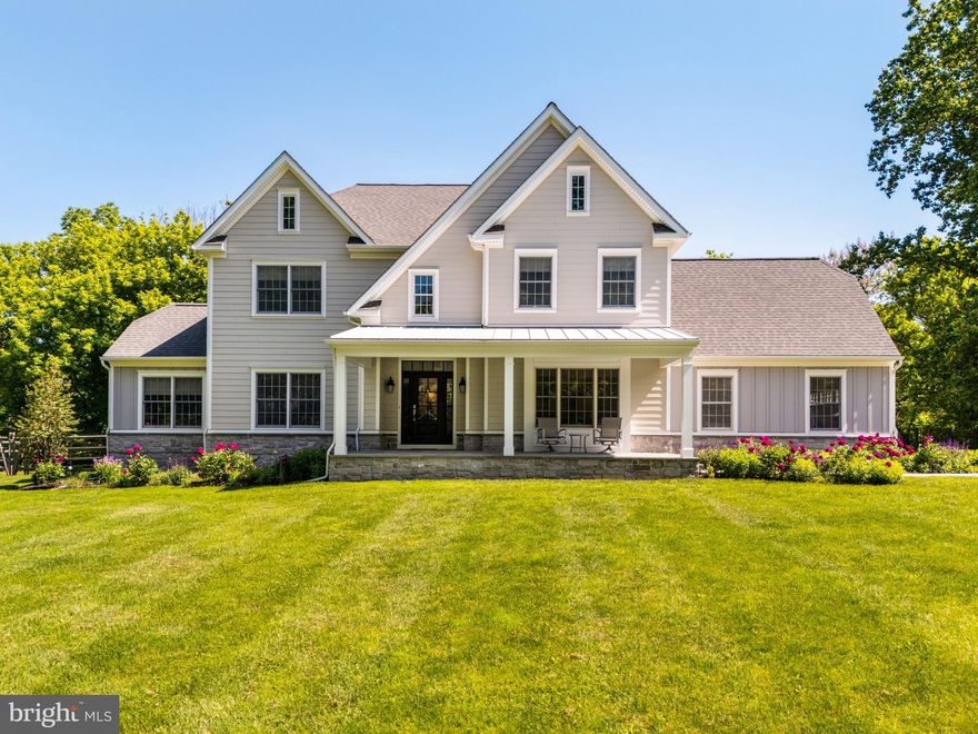 Experience two plus acres of peaceful beauty surrounded by nature on this private lot!  This 4-bedroom haven in Whitemarsh Township offers just that – escape from the daily grind without sacrificing convenience. Step inside the grand two-story foyer, a warm welcome to your completely refreshed home. The entire property has undergone a transformation, both inside and out. Exterior and interior design is by award winning architect Asher Slaunwhite + Partners, Jenkintown, PA with natural landscape planning by Terren Design, Conshohocken. The exterior boasts a brand-new look with gleaming siding, stylish doors, and a gorgeous rear deck, perfect for extending your living space and enjoying the huge back yard.
The heart of the house lies in the large eat-in kitchen, completely redesigned for easy socializing as well as serious cooking. Imagine gleaming new appliances, stunning granite countertops, and ample storage space – a chef's dream come true.  A perfect space for meals with loved ones and cozy evenings by the wood burning fireplace in the adjoining family room. Need a dedicated space for work or hobbies? The versatile living room seamlessly connects to a private bonus room, ideal for an in-home office or a quiet reading nook. Hosting a dinner party? The formal dining room, adorned with crown molding and bathed in natural light, provides the perfect setting. Enjoy lazy afternoons reading under a shady tree or hosting barbecues on the gorgeous, expansive rear deck, creating memories that will last a lifetime in the huge fenced in backyard 
The convenience factor doesn't end there. The first floor boasts a laundry room, a powder room, and a two-car garage for ultimate ease. Imagine waking up to sunlight streaming through the windows of your sprawling and luxurious primary suite, a private sanctuary with dual walk-in closets, a spa-like bathroom, and a separate sitting room bathed in sunlight from a skylight. The three other bedrooms are equally impressive and share a beautifully updated hall bath.
But wait, there's more! The finished basement, with its high ceilings, impressive millwork, and inviting atmosphere, offers endless possibilities. Create a recreation room for game nights, a dedicated home gym, or a spacious play area for the kids. A full bathroom adds to the functionality of this incredible space.
This stunning home in Whitemarsh Township in top-ranked Colonial School District truly has it all – peaceful seclusion, ample space, and the convenience of being close to major roadways, Chestnut Hill, Ambler, Conshohocken, and more. Don't miss out on the opportunity to find your haven.