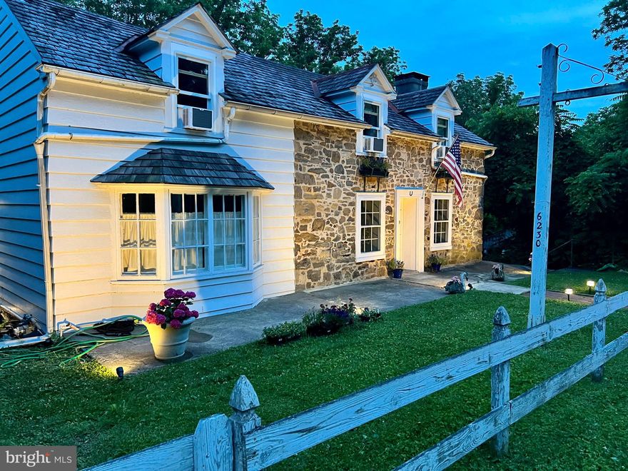 Don’t miss this rare opportunity to own/invest in an exceptionally versatile property with outstanding visibility along the highly traveled Route 202 corridor between New Hope and Peddler’s Village. Blending true historic charm with modern functionality, this circa 1750 Bank House with separate ranch building/garage offers dual zoning for both commercial and residential use, opening the door to countless possibilities for living, working, and investing. The main residence is full of warmth and character, featuring three bedrooms plus an additional office or non-conforming bedroom, two full bathrooms, and two stunning stone fireplaces that anchor the home in timeless style. Its flexible layout easily adapts to a variety of uses - whether as a comfortable family home, an elegant home office, or a professional space perfectly suited for a real estate firm, law office, or boutique business. The separate building on the property is currently configured for commercial use and includes a new bathroom, tankless on-demand water heater, new roof and plumbing for a kitchen and washer/dryer, making it ideal for conversion into a studio, creative workspace, or live/work suite. The property is further enhanced by a new septic system, new water filtration and softener in the main house, garage space, and 10+ newly paved outdoor parking spaces - rare assets along this sought-after stretch of 202. The garage unit presents even more potential: it can be fitted out for short-term rental use (with the main house as your primary residence) or converted into a comfortable dwelling while generating short-term rental income from the main house. Alternatively, it could serve as a long-term rental or primary residence while the main house is used for business operations or retail. A new two-year lease was just signed in the main house with very reliable long-term tenants, offering immediate stability and peace of mind. Whether you’re an investor seeking reliable rental income exceeding $5,000 per month with current high-quality leases and tenants, a business owner desiring premium exposure in a high-traffic location, or someone looking to combine home, office, and income opportunities all in one, this property offers a truly remarkable blend of flexibility, visibility, and historic appeal in one of Bucks County’s most desirable and well-traveled corridors.