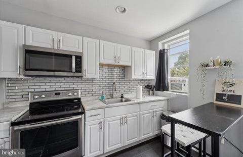 Photo of 7018 Woodland Avenue, PHILADELPHIA, PA 19142 (MLS # PAPH2660398)