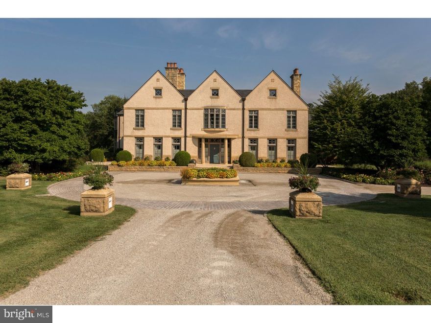 Motivated Seller! Once in a great while a magnificent property like this comes on the market. Sitting beyond impressive iron gates and a beautiful entry courtyard, nestled on a private tree lined cul-de-sac street. The 4.97 acres are park like with total privacy and surrounded by the Pennypack Watershed on all sides. Enter the sunlit front to back 2.5 story Foyer with the main staircase that has a custom banister. This is one of three staircases in the home. 5 Bedrooms, 7 Full Baths and 2 Half Baths all have timeless integrity and attention to detail. This home is an ideal family home that offers opportunity for grand entertaining. An elevator will transport you to all three levels. Hardwood floors are found throughout the first floor with tile floors in Entry, Kitchen and Butler's Pantry. Woodwork and decorative moldings including on the ceiling beautify this home. Elegant Living Room and  formal Dining Room have floor to ceiling doors that acts as windows to allow generous amounts of sunlight in. Both rooms have fireplaces. The Library has a large bay window, wet bar, fireplace, built-ins and large screen tv makes this a wonderful room to watch all sports. Indoor pool has 11 doors leading to the magnificent grounds. The room is 2.5 story ceiling with windows at the top of the beamed ceiling. The gourmet Kitchen and butler's Pantry have all the necessities for entertaining. A large pantry has a wine refrigerator. There is an eating area. The Butler's Pantry serves the Kitchen and Dining Room. The upstairs balcony landing connects the master suite to all the rest of the house. the balcony is dramatic overlooking the back grounds, front Foyer and Sun-room perfect for growing plants year round. Occupying one wing is the fantastic Master Suite that includes a sitting room, fireplace his and her baths, unbelievable walk-in closets and a separate Exercise Room with steps to indoor pool. In the other wing you will find a large Office with a full Bath that could be another Bedroom, 2 more generous sized Bedrooms with their own Full Baths, large Laundry Room and Nanny Suite with Kitchenette, Living Room and separate Bedroom complete the second floor. Take the elevator to the lower level with a Family Room that has a fireplace, half Bath, Hobby room and many mechanical rooms. Enjoy the tranquility and peace of the backyard as you sit on the custom patio. Completing the home is a 4 Car heated, attached Garage, full house generator and 1000+ amp circuit breakers.