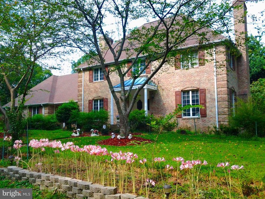 PRICE REDUCED  TO  $820K, $12K LOWER THAN TAX ASSESSMENT. HURRY!  View this video : https://youtu.be/HpnEtoE9nKA. Heaven on Earth. Come home to this wonderful all brick colonial on 5 acres backing to the private pond in the heart of Clifton. Minutes to Town since the road to your home intersects Main Street of the Town of Clifton. Yet it takes you through scenic views up up the hilltop, views the bridge, enters the gate guarded by two horses, to relax in your own home. Greet your guests in the large family room near a fireplace, have a sit-down dinner in the formal dining room,  or have a reception in a newly renovated kitchen with granite countertop, recessed lights, new range, and range hood. There is a second entrance to the family room where you can have your own fire chat with only intimate friends. The Master Bedroom is large, with a luxury bath including a jacuzzi and a separate shower. All the other bedrooms are in good size with plenty of picturesque windows.  Nature abounds. The basement is fully finished with a walk-out. There is a second family room near the third fireplace with woodstove insert. The wetbar will help to ferment your conversation. There is a large bonus room that can be used for media room. A full bath will welcome any guest who has to stay overnight. Walkout to the patio, you will see a private pond down some steps. Water fouls have been waiting there for you. Or you can take advantage of the hot tub nearby, instead of getting on the canoe after having some wine. Life is good.  This home is only minutes to the Town of Clifton, Fairfax Old Town, Fairfax Court House, George Mason University, Fairfax County  Government Center, FairOaks Mall,. It is 15 minutes to the Burke VRE where you can ride to the Pentagon. Easy access to 123, Burke Center Parkway, Fairfax County Parkway, Route 50, 66, 29, 28, The best school pyramid of Robinson will ensure that you can grow your young family here from K-12 while enjoying the best of both worlds. Open House this Saturday, March 14, from 2:00 pm - 04:00 pm. See you then! List of updates includes: New Water Treatment System 2013, New Roof 2014, Hot Water Heater 2014, New Garage Door & Openers 2016, New Kitchen Granite Counter 2016, New Range & Rangehood 2018, New Duct 2019, New Recess Light in kitchen and family room 2019.  New  Heatpump unit 2019. .