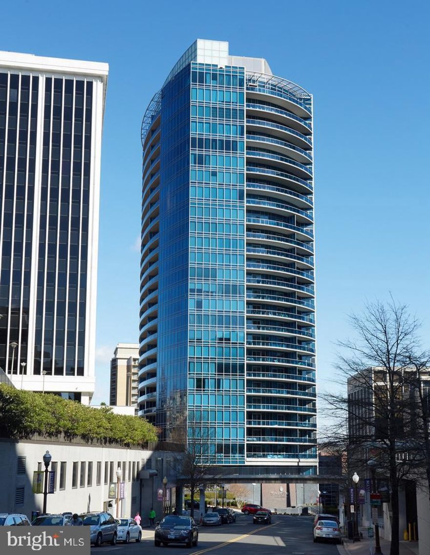 Welcome to Turnberry Tower Arlington,  a full service building known for its legendary levels of service. Elevator entry directly into this "E" model floorplan,  along with a separate service entry as well. The E model is distinguished with two balconies, and two bedrooms on opposite sides of the unit, along with 2 baths and a half bath.   Top of the line finishes and appliances include Miehle, Sub Zero and more.   The only utility the tenant pays for is electric.  This 1800 square foot floorplan has floor to ceiling windows and is located on the corner of the building facing south.   The kitchen is top of the line Snaidero cabinetry and is open to the dining room and living room.   The owners suite comes complete with both walk in closets and a large sumptuous marble bath with glass shower and soaking tub.   Turnberry provides 24/7 valet parking, front desk and an exercise facility that includes top of the line equipment, yoga/dance studio and indoor pool.  A private theatre and entertaining room with catering kitchen are also available to all residents.  Due to Covid showings must be scheduled 24 hours in advance with listing agent and all protocols are strictly adhered to including masks and no more than 2 persons with agent in the unit. Anyone with fever or symptoms will not be permitted access.  Turnberry Tower has a move in/amenities fee and also mandatory lease addendum, along with a scheduled orientation with building manager.