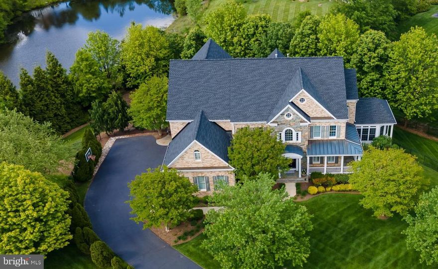 Have you always wanted to move up to Oak Hill Reserve?  Now is your opportunity to live in the crown jewel of this coveted neighborhood.  You will be captivated with the interior and exterior of this absolutely stunning home that is perfectly sited on a spectacular .83 acre private lot at the end of a quiet cul-de-sac.  Quality built by Winchester in 2003, the original owners spared no expense when building and maintaining their dream home selecting every imaginable option.  It will check every box on your must have list - 6 bedrooms, 4 full and 2 half baths, 3 car side load garage, 2 light filled solariums, walls of windows and natural light, generously sized formal and informal spaces, and massive walk-in closets. The walk out lower level provides hours of entertainment and fun with a game room, theatre and exercise room, plus excellent options for work/school from home, and multi-generational living.  The impressive interior is equaled by the impressive exterior with the stone front and wrap around porch providing maximum curb appeal.  The expanded deck off the kitchen provides gorgeous views of the lushly landscaped lot and pond, as do the balconies off the dining room and primary bedroom, and the lower level patio.  The lot can accommodate a pool. Situated in the sought after Crossfield, Carson, Oakton school pyramid, and in a prime location with easy access to major commuter routes and metros, the Dulles Airport, Inova Healthcare System and convenient shopping and restaurant options in Fairfax, Reston and Tysons.  Come home to 3210 Rose Grove Terrace and live the dream!