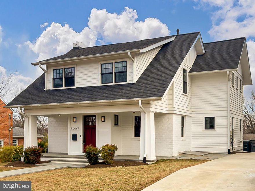 🏡Welcome to Exquisite Living at 1007 N Sycamore Street, nestled in the heart of Falls Church City! • This stunning 5-bedroom, 4.5-bathroom residence offers unparalleled luxury and thoughtful design • Custom built by Moore Architects in 2019, find elegance and convenience at every turn • Enter the home through the charming and spacious front porch and step inside to the open and inviting Main Level with gleaming hardwood floors and ample natural light • The Foyer with built-ins leads you to a bright Living Room with a gas fireplace, perfect for relaxing evenings, while an adjacent Office with barn door provides a quiet space for work or study • An open floor plan connects the Gourmet Kitchen, Dining Room, and Family Room, all with access to an expansive Screened Porch that extends the living space outdoors • The Kitchen is a chef's dream, featuring ample custom cabinetry, stone countertops, stainless steel appliances, a custom panel refrigerator, a large center island, and an opportune pantry, providing all of the storage you need • A stylish Powder Room and spacious double-Mudroom with side-entry door complete the Main Level • Upstairs, the warmth of hardwoods and natural light continue to span the Upper Level, home to four bedrooms and three Full Bathrooms • The expansive Primary Bedroom Suite features an entry hall with built-in shelving, a stunning ensuite Full Bathroom with a soaking tub and a luxurious walk-in shower, and the walk-in closet of your dreams • A second Bedroom with a walk-in closet and ensuite Bath provides comfort and privacy • Two additional Bedrooms and a beautifully appointed Jack and Jill Full Bath complete the Upper Level • Downstairs, the versatile and functional Lower Level boasts a generously sized Rec Room with gas fireplace and walk-out level access to the backyard and a custom stone patio, offering plenty of space for entertainment and play • A fifth Bedroom and fourth Full Bathroom provide additional living space, while a dedicated Laundry Room with convenient cabinetry and two oversized storage closets enhance the home's functionality • Outside, the fenced backyard with ample green space is perfect for outdoor gatherings or simply enjoying the serene surroundings • The upper screened porch enhances the outdoor living experience, making it ideal for entertaining or unwinding • EV Charger & Generac Whole Home Back Up Generator convey with the property • Conveniently located just a 1/2 mile to the East Church METRO Station • Easy access to commuter routes I-66, 495, Route 7 & Route 50 makes commuting to DC / Arlington / Tysons / Reston and beyond a dream! • Nearby shopping, dining, parks, and entertainment in downtown Falls Church City, including: the new Whole Foods, Founders Row, Birch & Broad, West End & more! • Falls Church City School District • Find the luxury and comfort you have been looking for at 1007 N Sycamore St - Love where you live, welcome home!