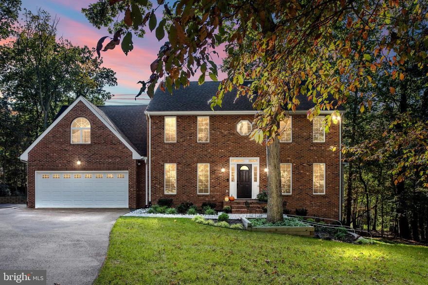 This COMPLETELY updated custom built home has been meticulously cared for by the original owner.  The kitchen has been recently renovated to include Tuscan Hills all-wood cherry cabinetry, granite countertops, stainless steel appliances, including a gas range, LED under- and over-cabinet lighting, and an oversized commercial-style sink. The updated family room flows effortlessly from the kitchen.  The gas fireplace is surrounded by ledge marble with a hearth of Pennsylvania bluestone; all of this tied together with shiplap accents and a flatscreen TV mount all wired and ready to go. All windows throughout the house are Andersen casement windows, which showcase the beautiful trees and private backyard.  Sun-Tek tempered glass skylights (replaced in 2019) are sprinkled throughout the house and add a nice touch and natural light. The main floor has gorgeous, recently refinished white oak hardwood floors in a matte natural finish. The upstairs has new plush carpet. All bathrooms throughout the house have been updated with elevated finishes and are in “like new” condition. Subway tile, designer double vanities, jetted tub with marble tile surround, quartz countertops, all new toilets, heated towel rack, and a river rock rain shower, are a few of the upgrades that you will see in the bathrooms.  The spacious private owner’s suite has vaulted ceilings, private dressing area with a barn door and soft-close pocket doors, and all the finishes conducive to a relaxing, spa-like experience. The second bedroom overflows with character and charm and it’s large size, with two closets, and a private full bathroom, offer additional possibilities for use.  The lower level has a rec room with wood plank ceramic tile floor, LED recessed lighting, French door with in glass blinds, and two walk outs. There is plenty of room for your storage needs in the lower level as well.  The lot and outdoor living area is just as luxurious as the interior.  Herb gardens and custom hardscaping surround a large beautiful deck (flooring was replaced in 2019). The oversized backyard is flat and grassy surrounded by trees- your options for how to use this yard are endless!  The professionally planned, front yard features newly planted shrubs, adding beauty for years to come. In addition to all this, the two car garage has additional space for added storage and flexibility. Roof and gutters were replaced with Landmark Pro High Def architectural shingles in 2019. Newer HVAC units (replaced in 2016 and 2021) for both zones. Hot water heater was replaced in 2015 and has a 12 year warranty. If you are looking for a home that is on a large, flat, private lot with all of the upgrades that have been meticulously planned and executed, this is the house for you!