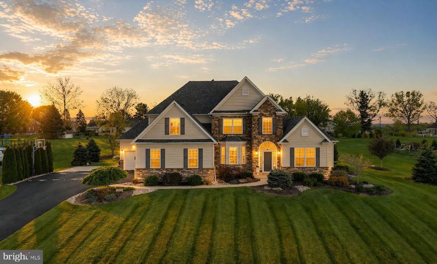 Set on a quiet cul-de-sac in the sought-after Nazareth School District, this 2016 newer built 5-bedroom colonial home delivers everything today’s buyers are looking for. Step inside the stone accented entrance to find 9-foot ceilings and an inviting two-story great room accented by a stone gas fireplace and abundance of natural light. The open-concept design flows seamlessly into a generously sized kitchen, complete with 42” cabinetry, a center island, corner pantry, breakfast area, and a dining room offering an elevated touch with tray ceilings and classic wainscoting, perfect for hosting gatherings. This 1st Floor Primary Bedroom retreat features a tray ceiling, dual closets, and a well-appointed en-suite bath with double sinks, vanity area, and a separate soaking tub—creating a true escape within your own home. A dedicated first-floor office provides the flexibility to work from home with a view, while the mudroom and first-floor laundry add everyday convenience. Upstairs, additional spacious bedrooms including a bonus room or 5th bedroom. Enjoy the outdoors on an acre of privacy with a luxury paver patio with pergola, built-in firepit and professional landscaping, playset and basketball hoop. Plenty of storage with a full lower level waiting to be finished, 3-car garage and storage shed. With scenic views, a peaceful setting, and close proximity, this home offers the best of Lehigh Valley living—space, style, and convenience all in one. Ask how to receive up to $5,000 lender credit towards closing costs or lowering your interest rate!