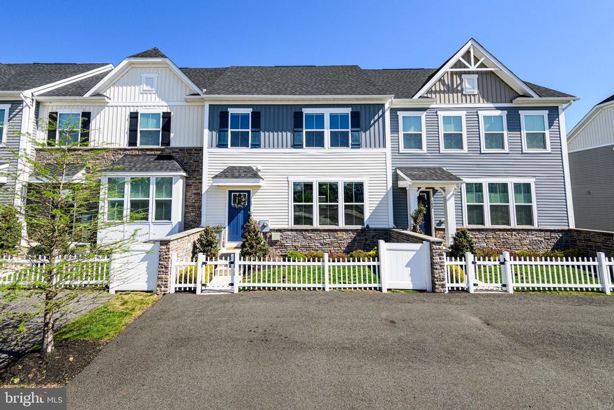 This stunning 3-bedroom townhome in Gilbertsville (Boyertown School District) truly stands out from the rest. From the moment you walk in, you'll appreciate the open layout, high ceilings, and beautiful hardwood flooring throughout the main level. The kitchen is a showstopper — featuring a huge granite island, stainless steel appliances, recessed lighting, double sink, and tons of cabinet and counter space. The dining area flows right out to a private deck, perfect for relaxing or entertaining. Upstairs, you'll find three spacious bedrooms, including a master bedroom with a walk-in closet and a master bathroom with double sinks, tile floors, and a glass stall shower. The laundry room is conveniently located on this level as well. But what really sets this home apart is the finished WALK-OUT BASEMENT — complete with a wet bar, perfect for entertaining! Additional upgrades include a high-efficiency gas HVAC system, central air, and a water softener system. Everything in this home is in excellent condition — it’s clean, upgraded, and move-in ready. All of this in a fantastic location close to parks, schools, shopping, and major routes. You don’t want to miss this one!