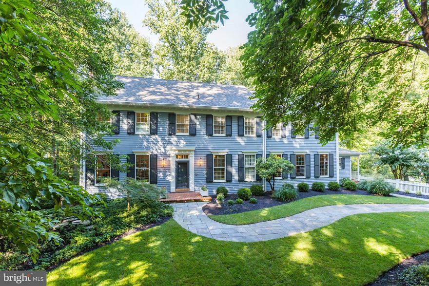 One of a kind home in a spectacular, secluded setting with convenient access to downtown DC, Northern Virginia and the I-270 corridor. Fabulous indoor and outdoor living overlooking a creek on a landscaped and wooded site. Elegant, warm and charming with modern lifestyle. Reclaimed beam ceilings, gourmet kitchen with all stainless appliances, custom cabinets and soap stone countertops. Bathrooms have recently been completely renovated including stunning master bath. Fully equipped butler's pantry, home office, exercise room and sauna are just some of the extra features. Move right in- every detail is perfect in the exquisite home. Churchill cluster.